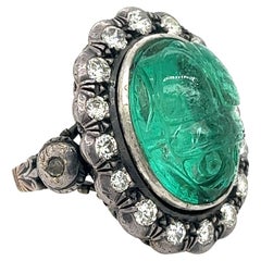Victorian Era 15 Carat Carved Emerald "Beetle" Motif Antique Diamond Halo Ring 