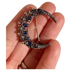 Victorian era 18K gold diamond blue sapphire crescent moon brooch