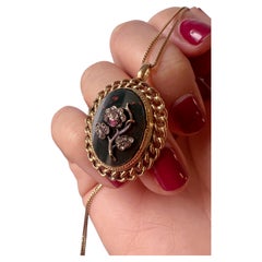 Victorian era 18K gold pendant with diamond ruby flower on bloodstone