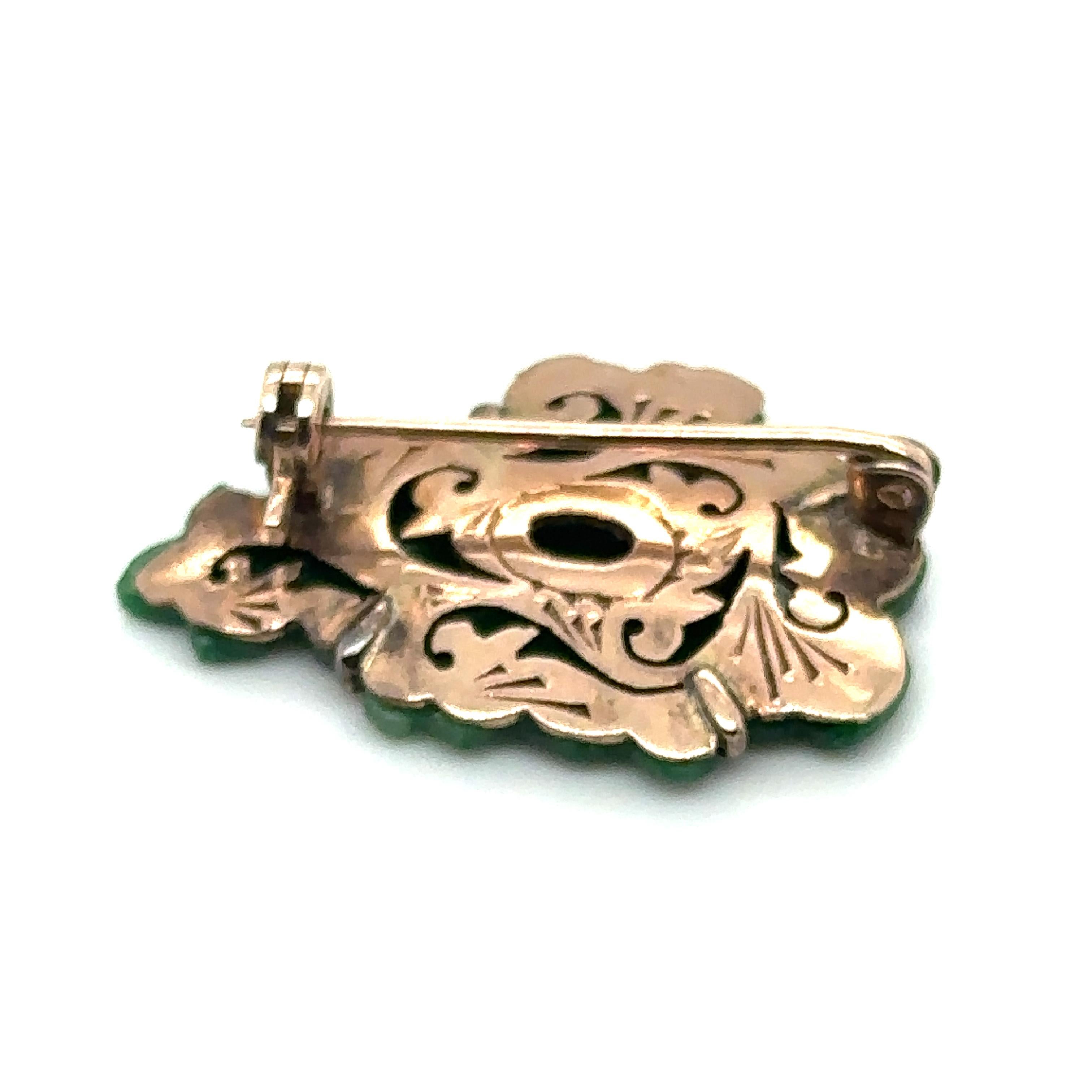 Women's or Men's Victorian Era Asian Carved Green Jade Brooch in 14 Karat Gold For Sale