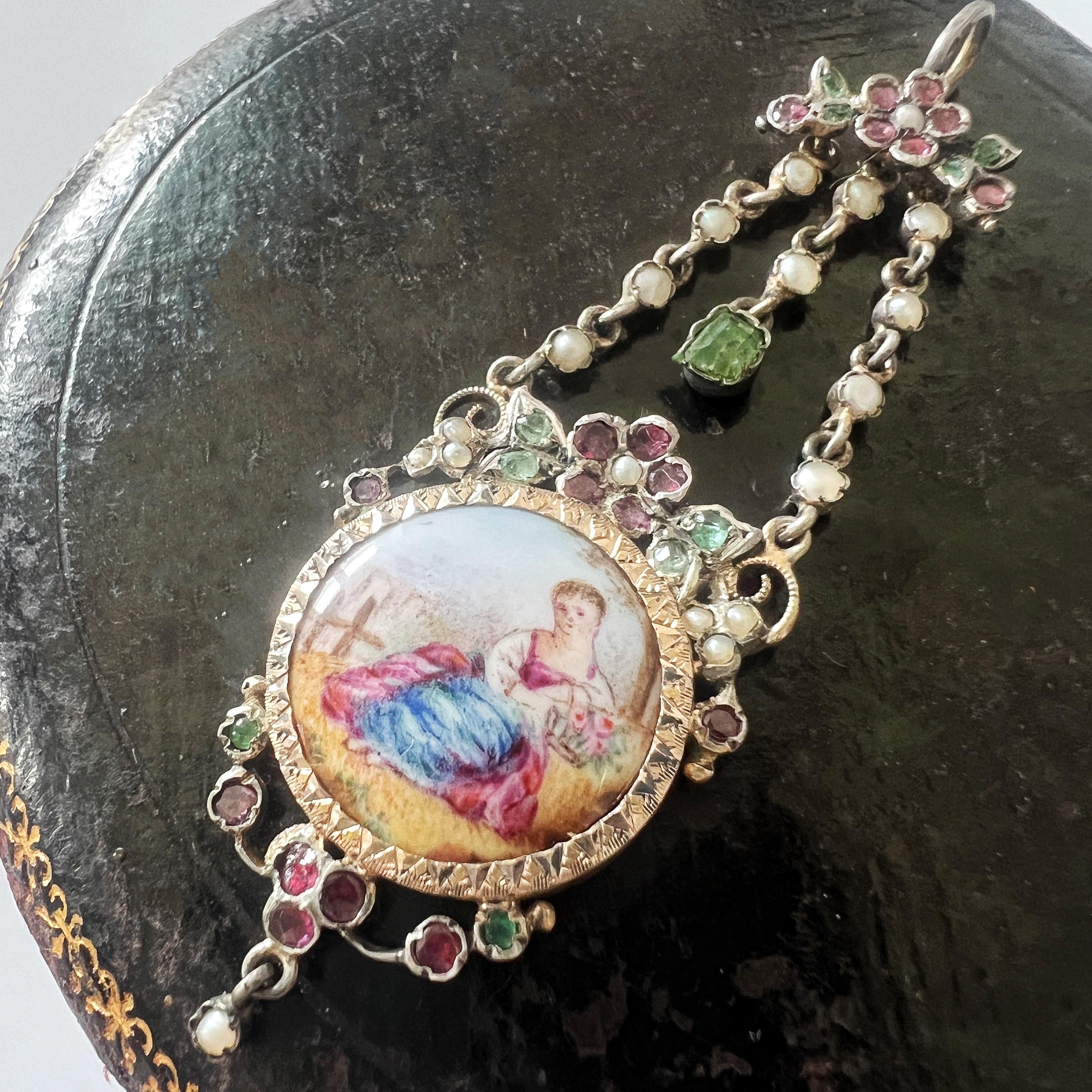 Victorian era enamel miniature portrait pendant with emeralds and garnets For Sale 1