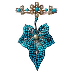 Used Victorian era gold turquoise leaf flower brooch