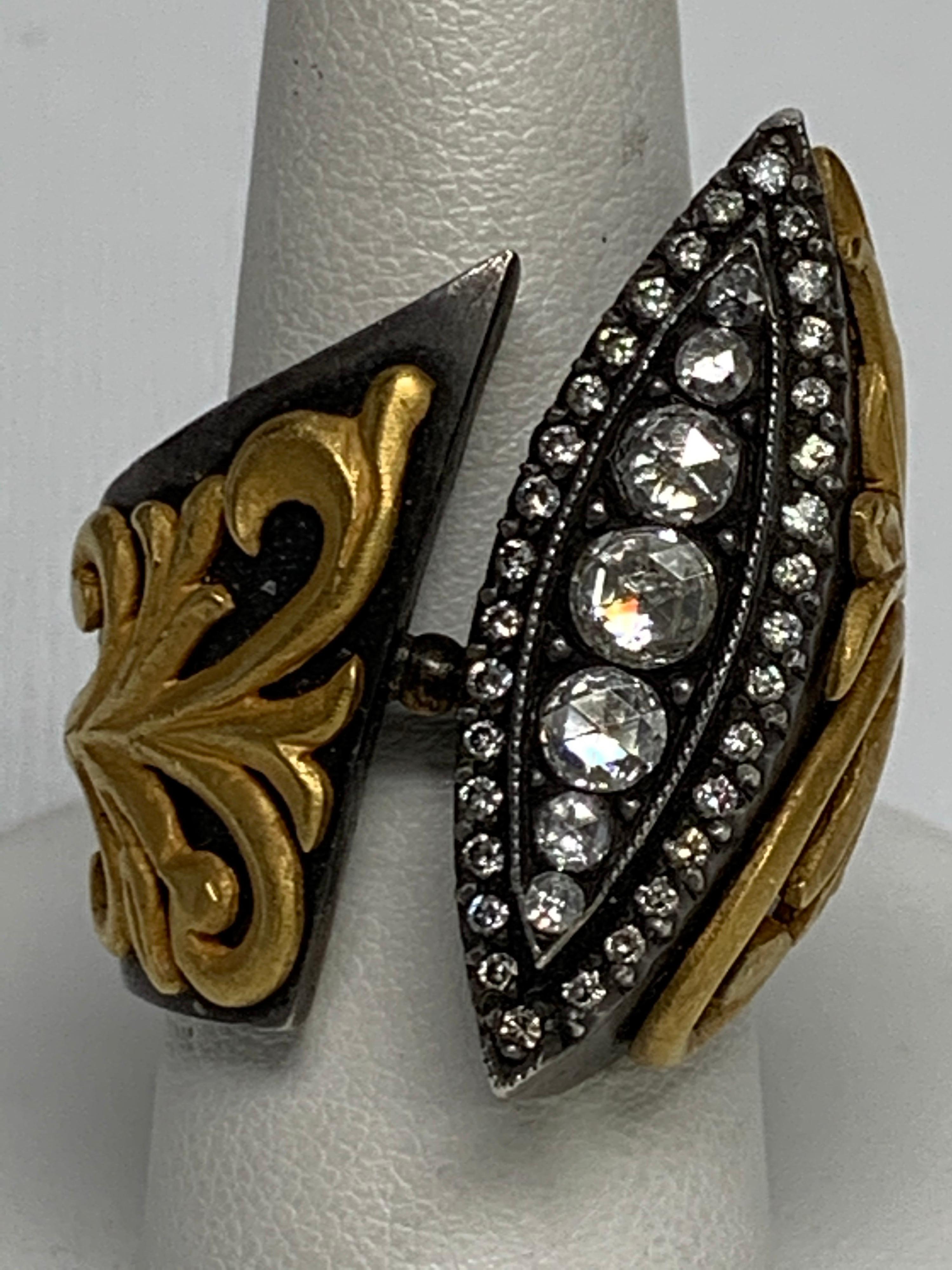 Round Cut White Diamond, Oxidized Silver & Yellow Gold Ring.  

Featuring a Round Cut White Diamond Ring with a total weight of 2.75 carats, set in Oxidized Silver & Yellow Gold.  Size, 7

This one-of-a-kind ring was created by hand is certified,