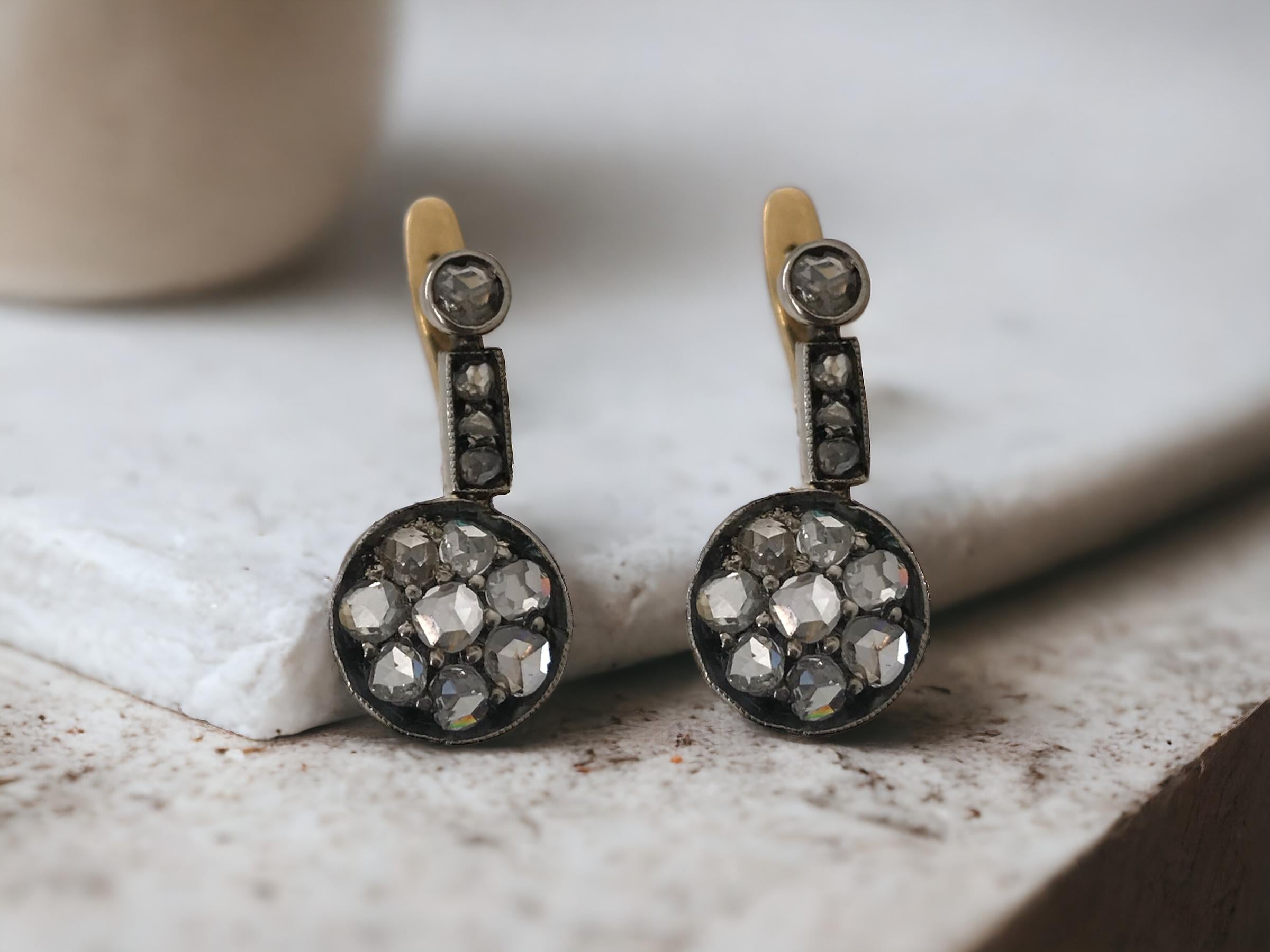 We always love rose cut diamonds!
Each stone has such character and uniqueness.

Earring Details
Material: 18K Yellow Gold Base & Silver Top
Era: Victorian Era 1840 - 1900
Length: 22.7mm
Width: 10.7mm
Weight: 4.1 Grams

Accented by the following