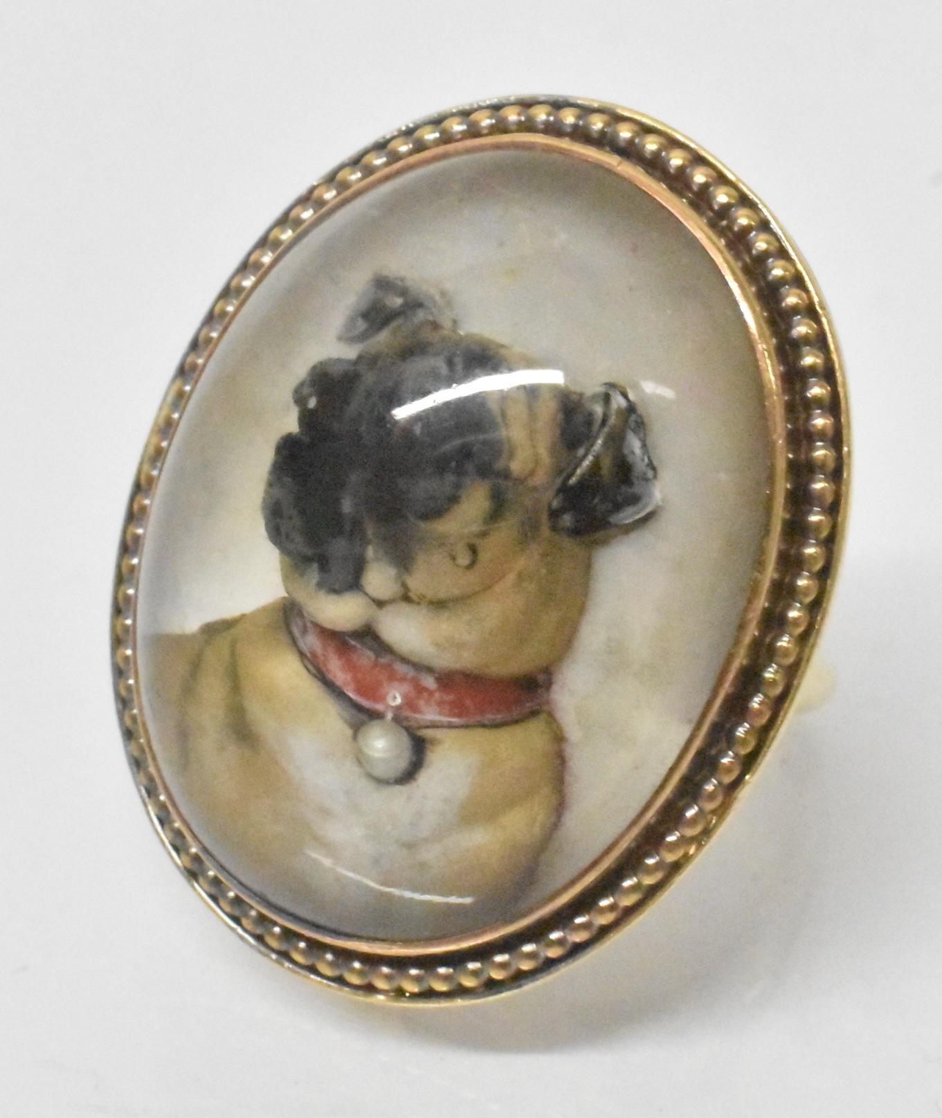 Victorian Essex Crystal Intaglio reverse painted pug ring, 10K. These rings were a novelty during the Victorian Period. Essex crystal cabochons were carved on the flat side with an image and then painted to give a 3-D impression when viewed through
