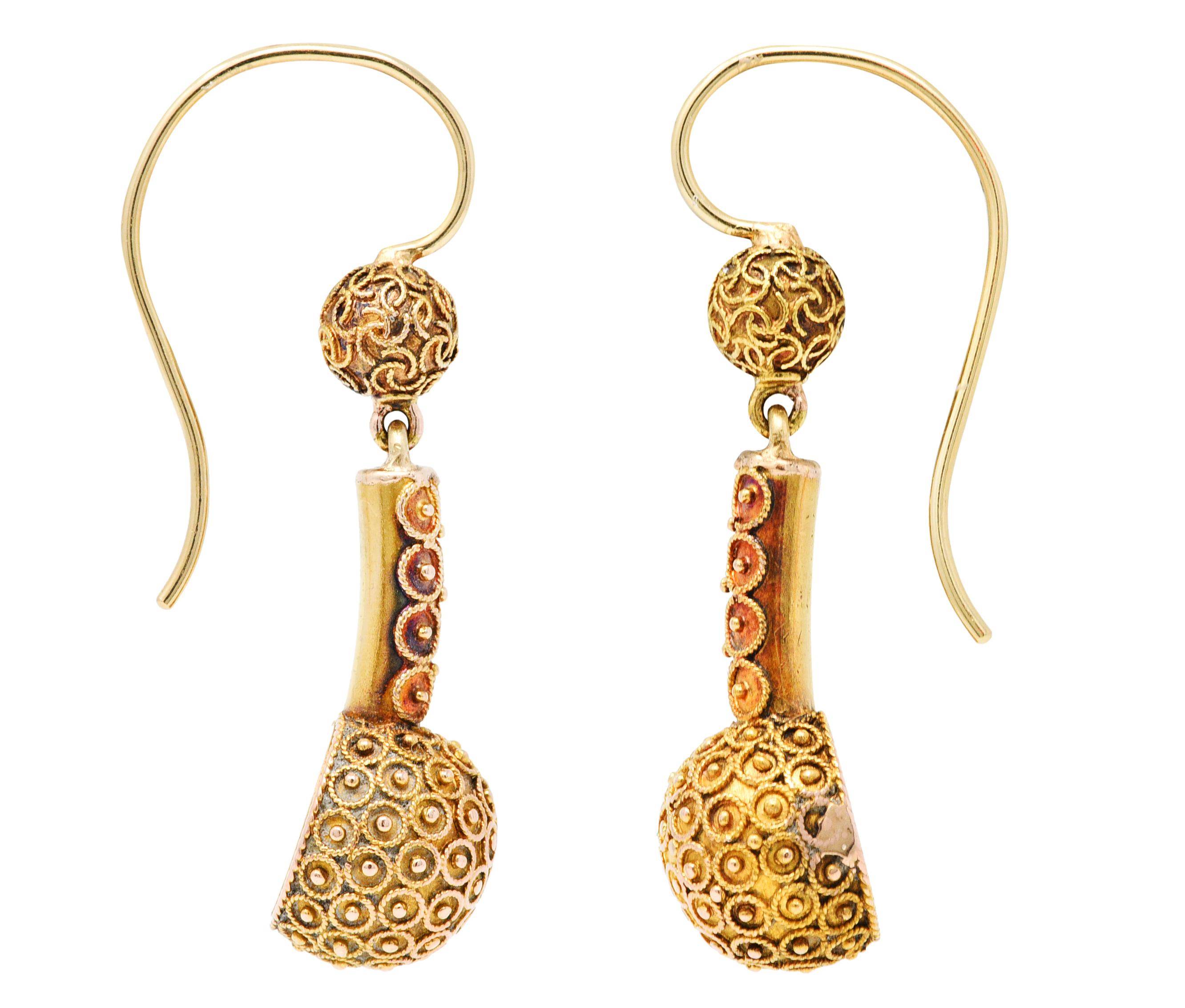 Shepherd hook earrings have a 5.6 mm ball surmount

Suspending an elongated bar terminating as a 10.4 mm ball

With twisted rope and gold bead accents throughout

Tested as 14 karat gold

Circa: 1870s

Measures: 3/8 x 1 1/8 inch

Total weight: 4.7