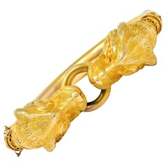 Victorian Etruscan Revival 18 Karat Gold Double Lion Head Manschette Armband