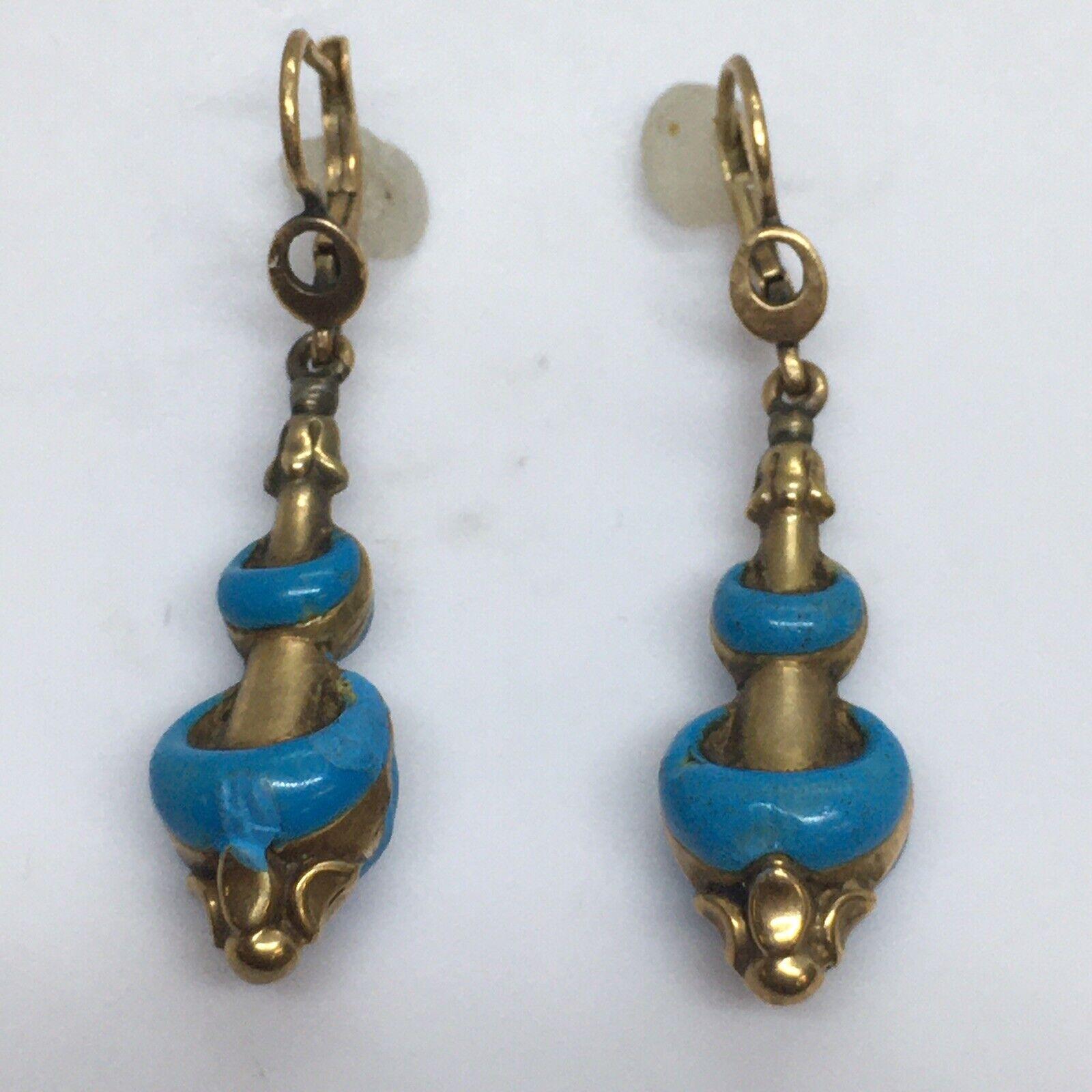 Victorian Etruscan Revival Drop Dangle Earrings 14 Karat Gold Enamel Light 1880s


3.9 gram
Unmarked tests 14k gold
Hanging 1.5 inch
Wear and tear, item is 140 years old, wear and tear is consistent of age, see pictures 
No Hallmarks, Loss to enamel