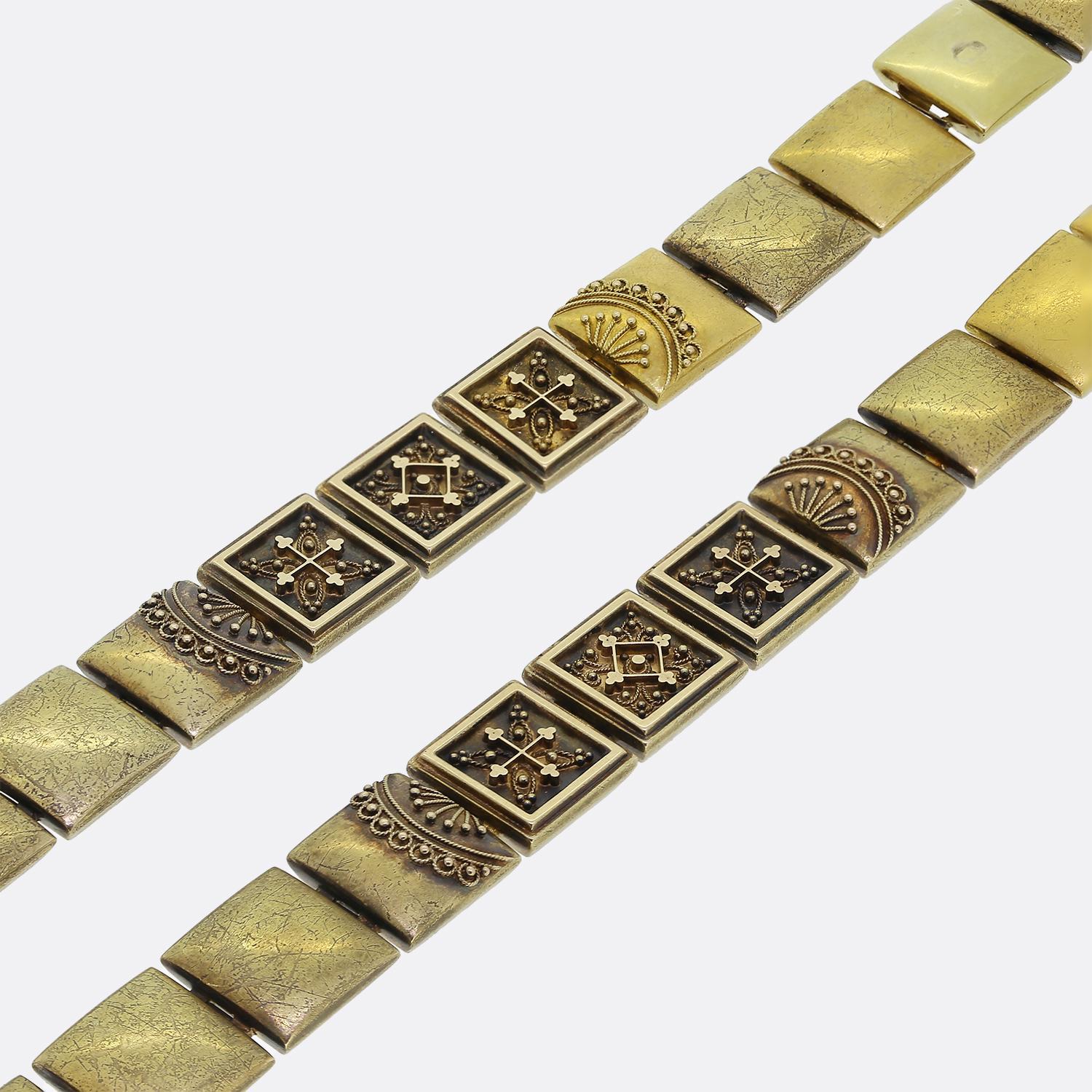 Here we have an exquisite 19th-century Etruscan Revival bracelet set come necklace. This set includes two identically designed bracelets crafted from 18ct yellow gold featuring detailed geometric patterns and textured surfaces with a strong emphasis