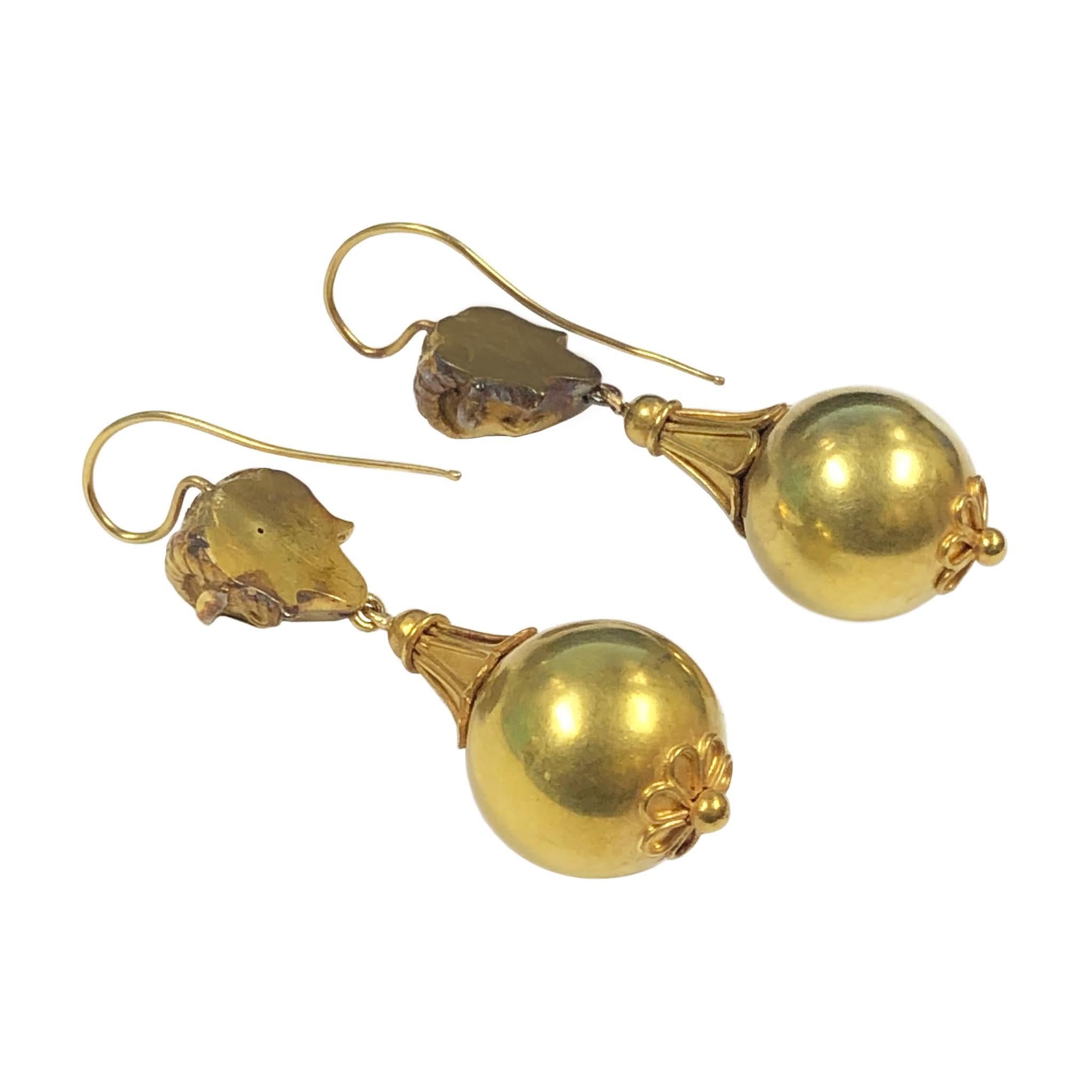 Circa 1880 Etruscan Revival Earrings, testing as 14k - 15k Gold, Large articulated and Impressive, measuring 2 1/8 inches in length with the bottom ball portion measuring 5/8 inch in diameter. The tops are a phenomenal well detailed Dimensional Rams