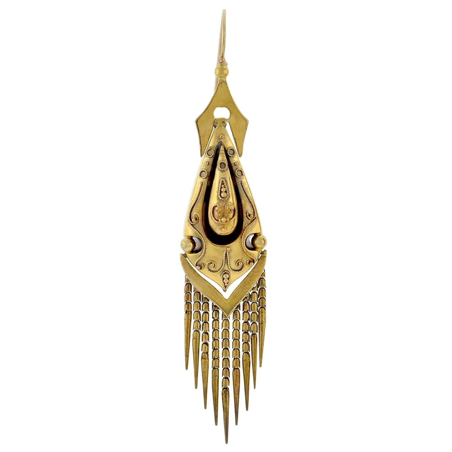 A fantastic pair of foxtail fringe earrings from the Victorian (ca1880) era! Crafted in 15kt yellow gold, these stunning earrings display a dramatic hanging design. Each side features an elaborate 3-dimensional teardrop shaped link that appears to