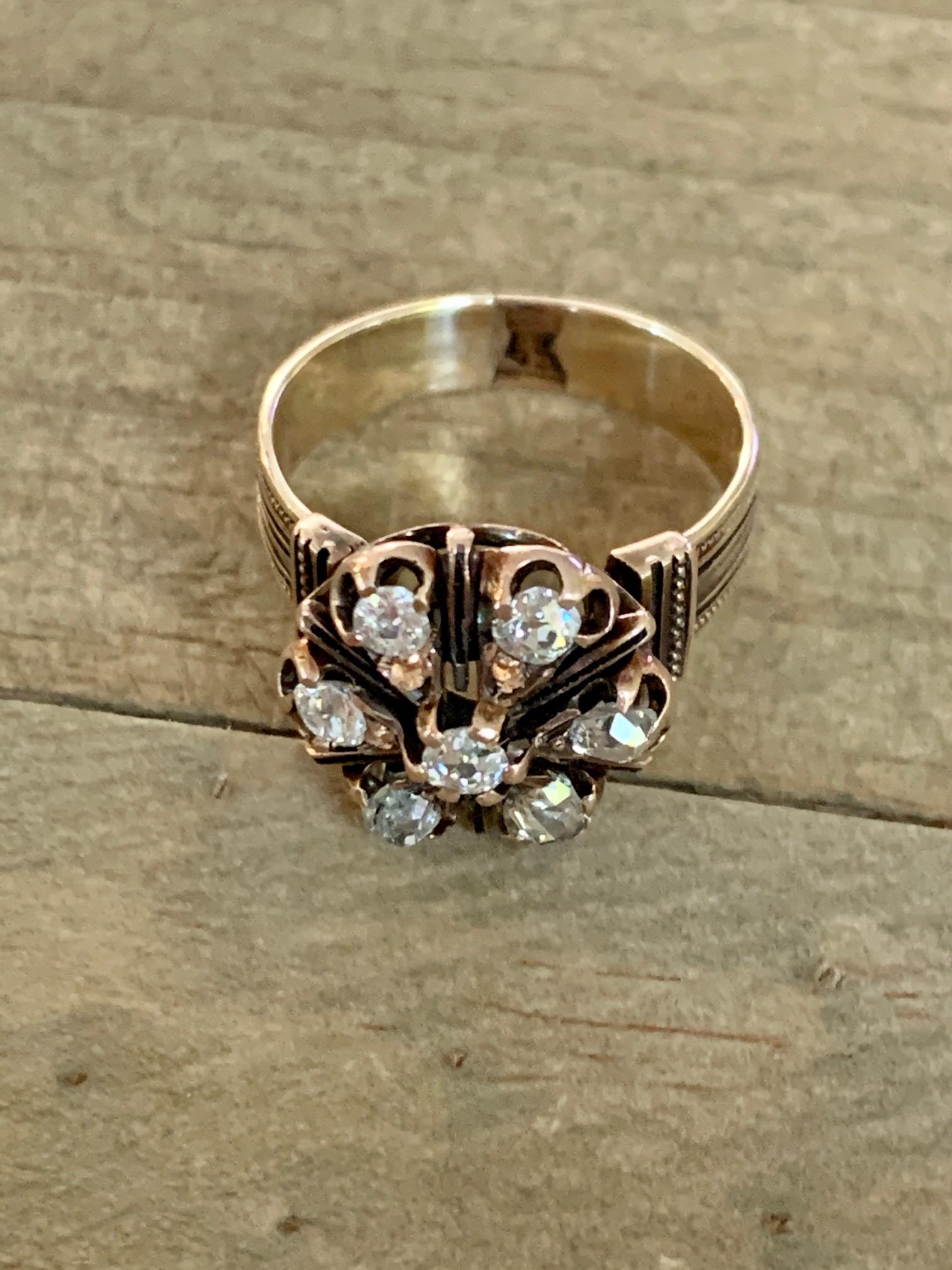 This Victorian 14k yellow Gold ring features seven Euro and mine cut Diamonds totaling approxmately .70ctw.
Average grade: SI-GH

Weight: 5.7 grams
Size 7 3/4 - -This ring can be resized, but G. Lindberg Jewels does not provide sizing services. We