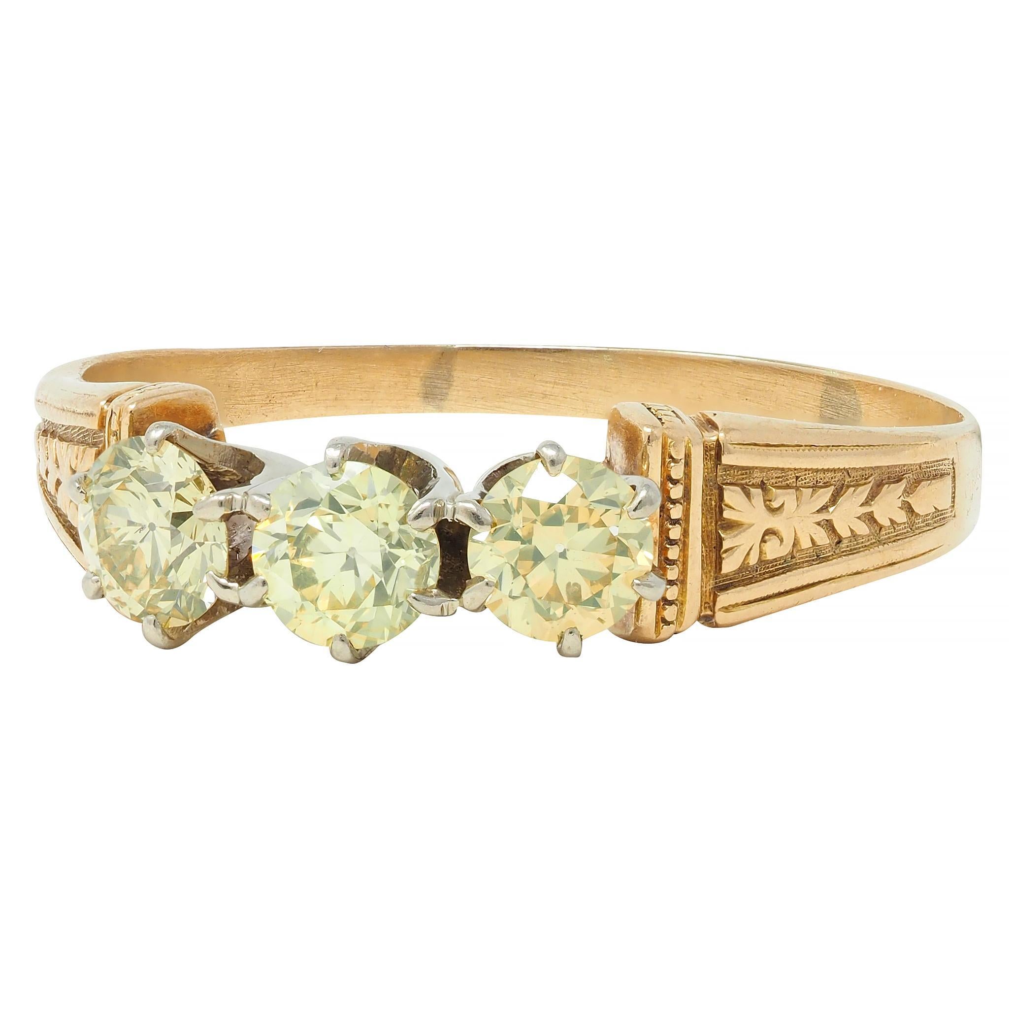 Victorian Fancy Yellow Diamond Platinum 18 Karat Gold Three Stone Antique Ring For Sale 1