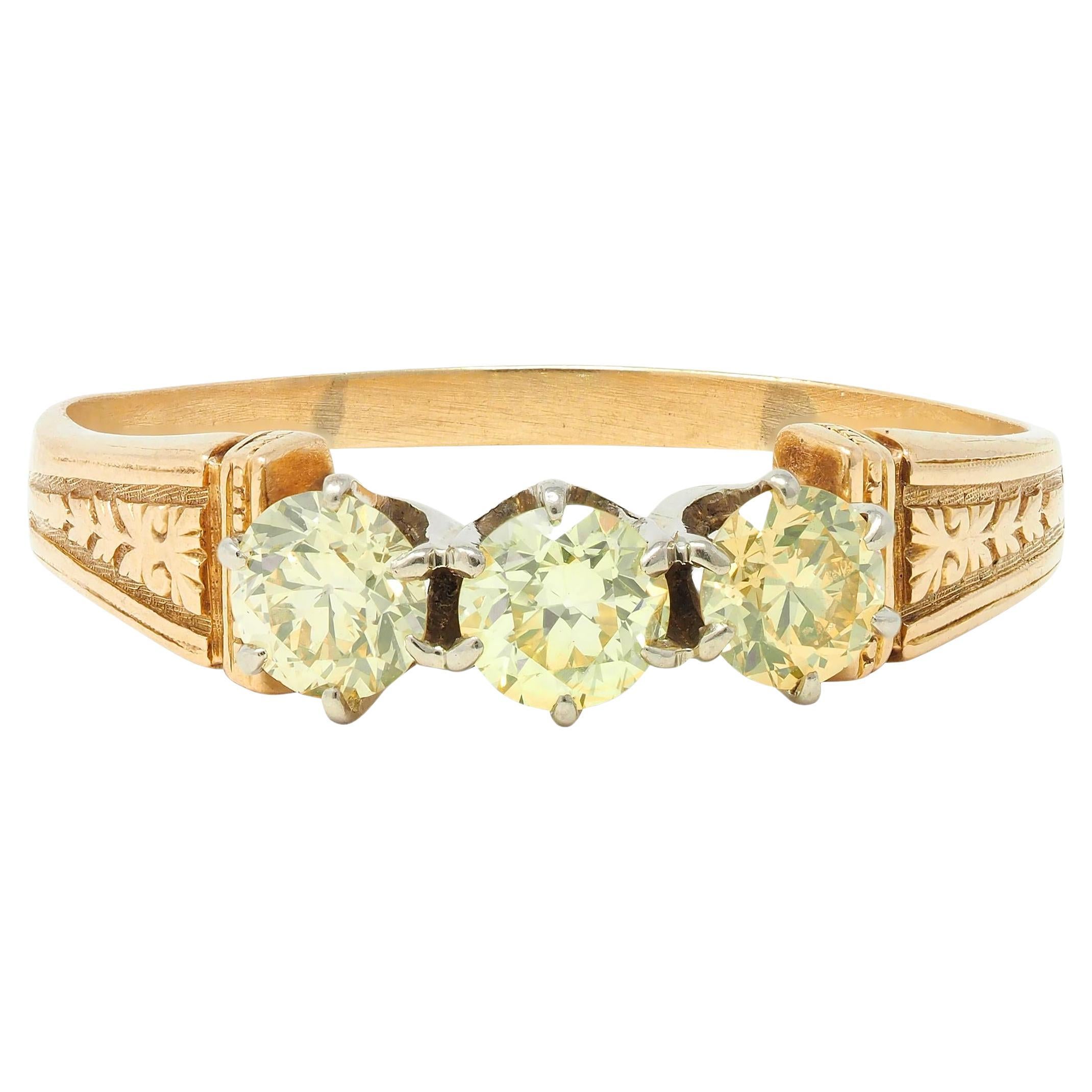 Victorian Fancy Yellow Diamond Platinum 18 Karat Gold Three Stone Antique Ring For Sale