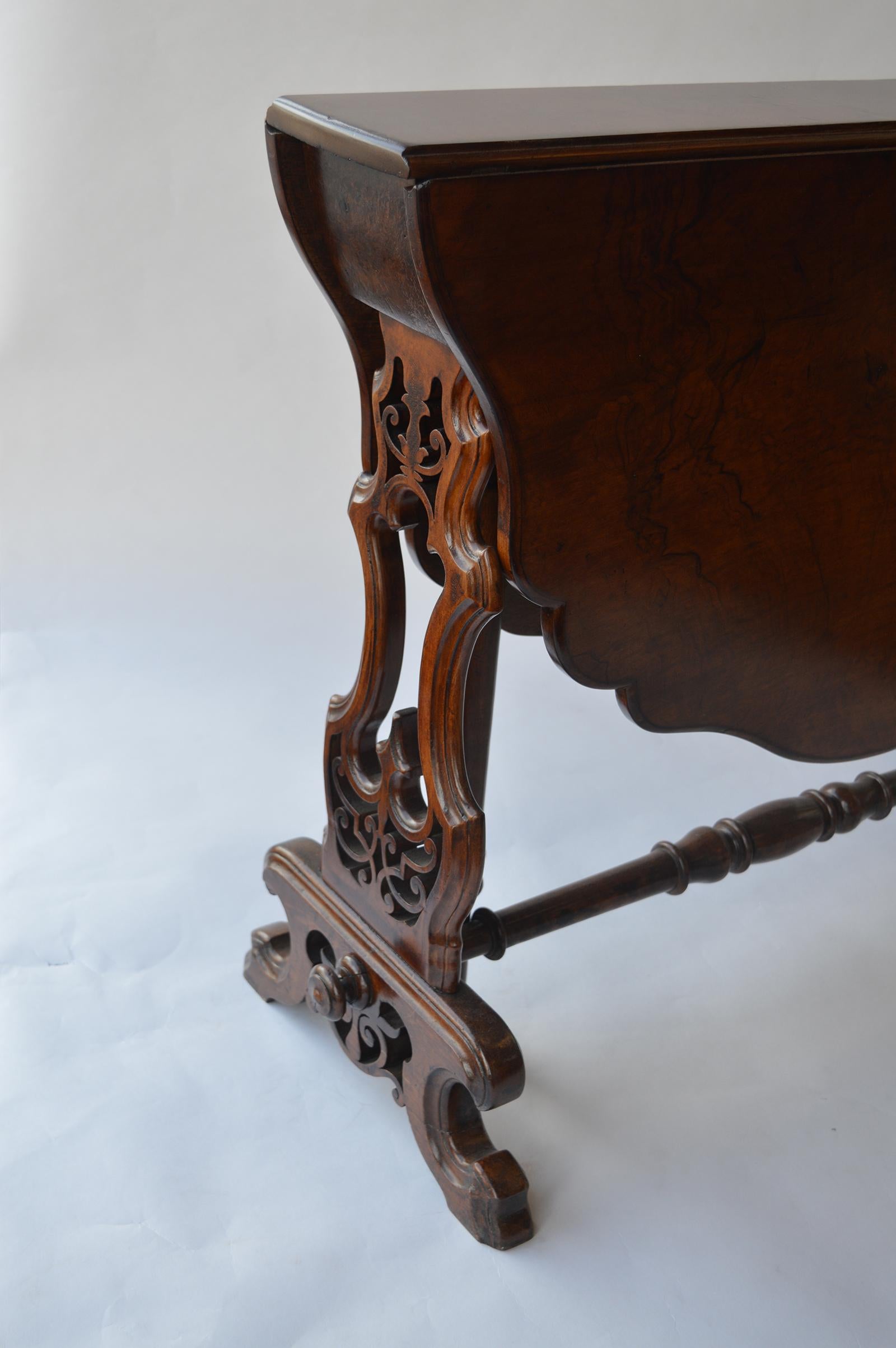 Second half of 19th century. Victorian figured walnut sutherland table.