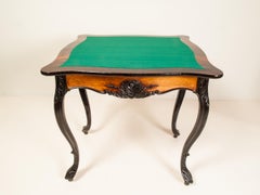 Victorian Fine Carved Partly Ebonized and Rosewood Game Table