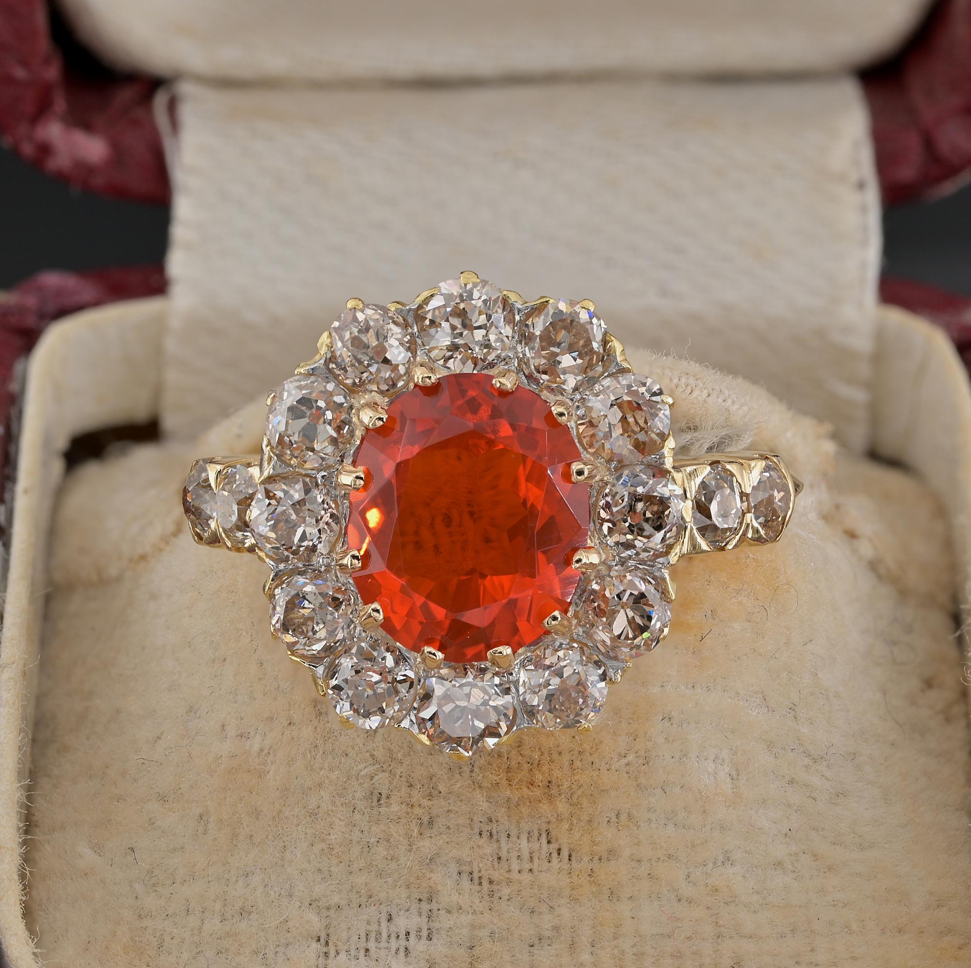 Treasure to get hold of!
Magnificent authentic Victorian Fire Opal & Diamond ring 1870 Ca!
Crafted during the time of solid 18 Kt gold, marked, glorious fine workmanship from the period
Classic cluster style made by the beauty of the gemstones set