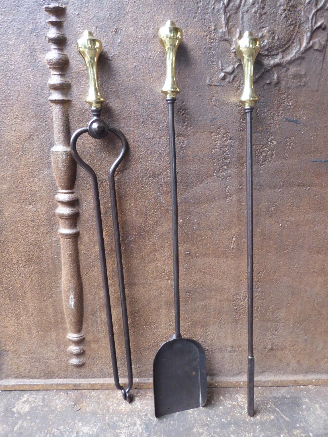 19th century English Victorian set of three tools made of wrought iron with and polished brass handles. The set is in a good condition and is fully functional.







 
