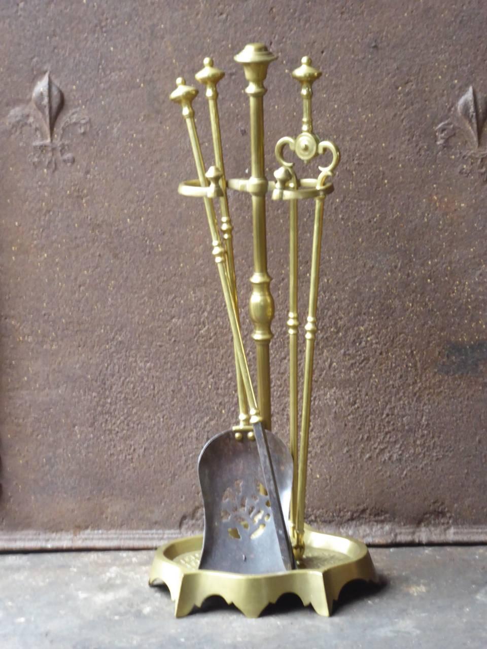 19th century English Victorian fireplace tool set, fire irons made of brass. The fireplace set is in a good condition and is fully functional.







 