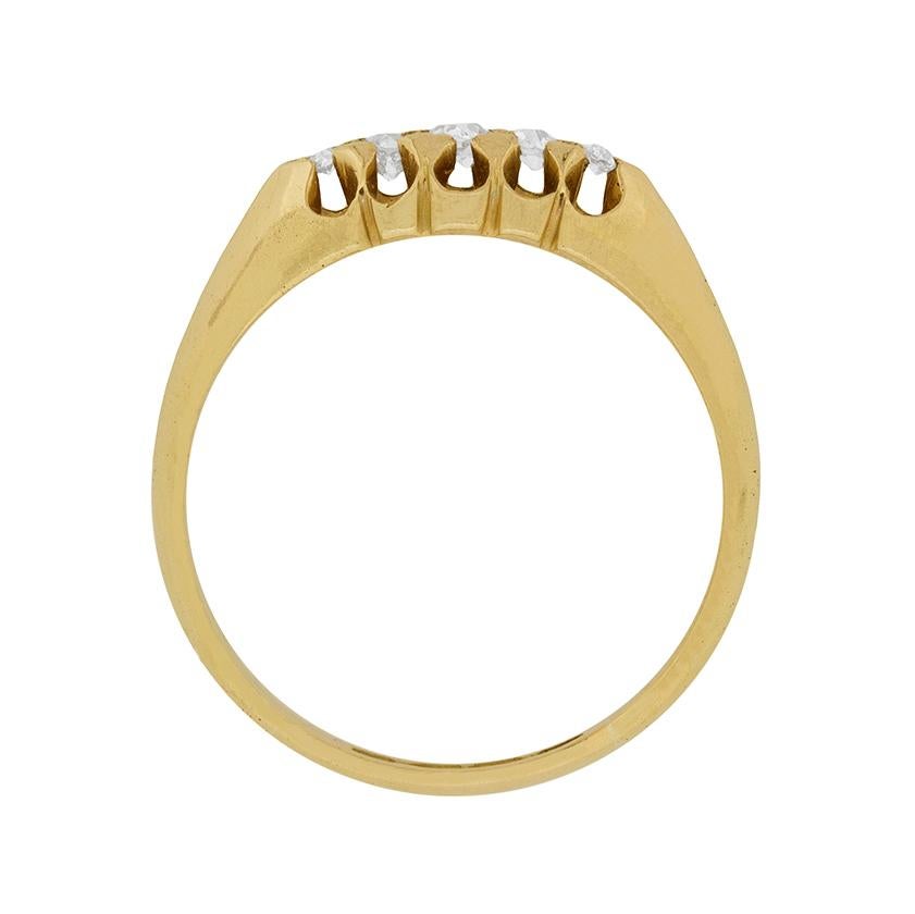 This is a wonderful little five stone ring, dating back to the Victorian period. The diamonds are old cuts, which would have been hand cut, and hand set into the 18 carat yellow gold mount. The craftsmanship of the ring is impeccable and the