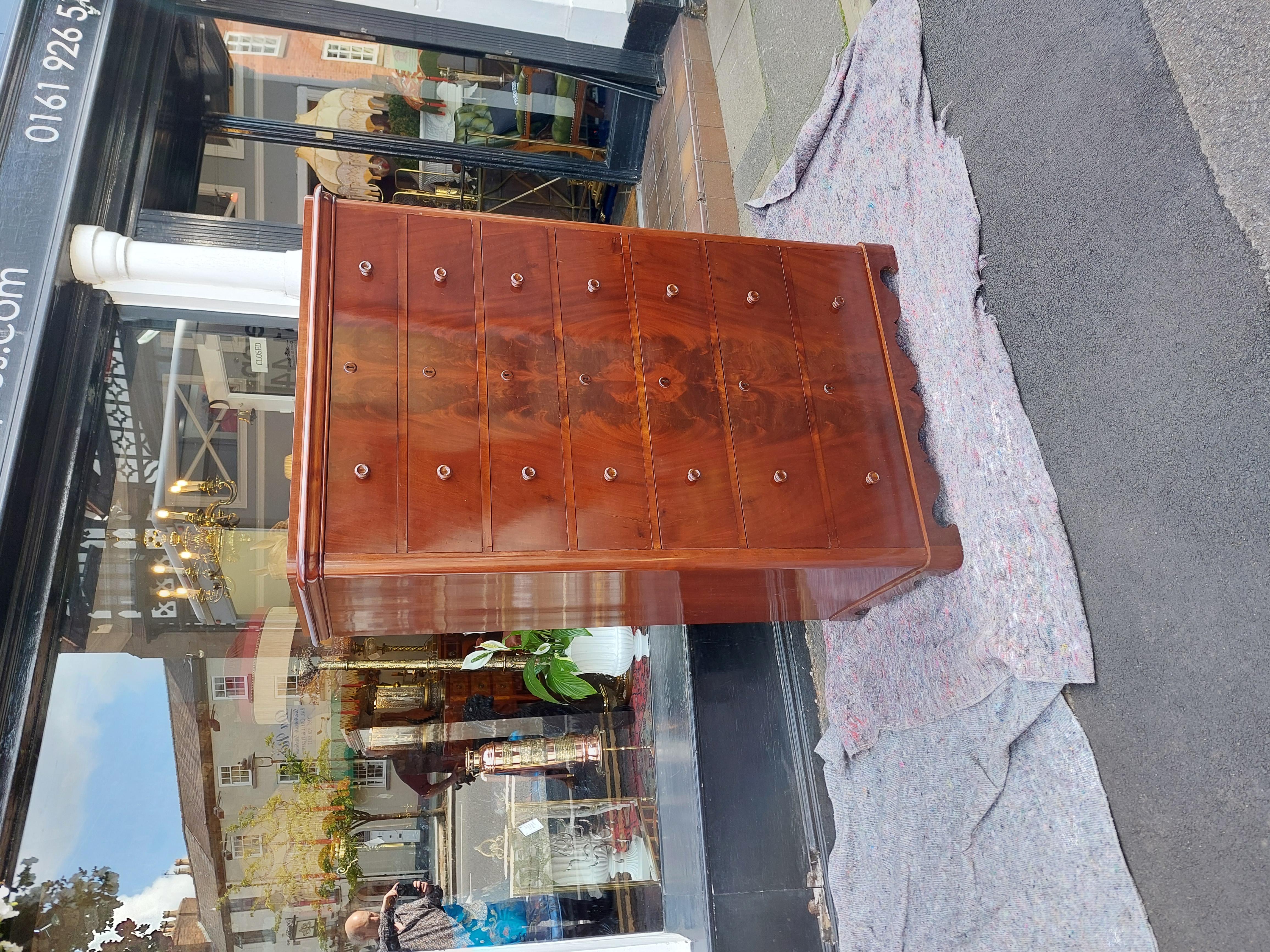 Victorian Flame Mahogany Semanier Chest with flight of seven graduated long drawers, set on bracket base - 41