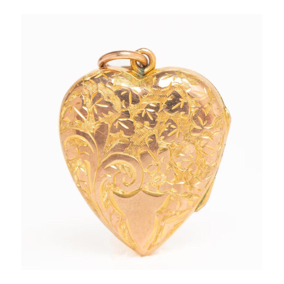 Beautiful Victorian floral 9ct gold back and a front heart locket with an engraved foliate design. The locket was made circa 1900 and it's in good antique condition with a shield shape part of the design which could be personalized with an engraved