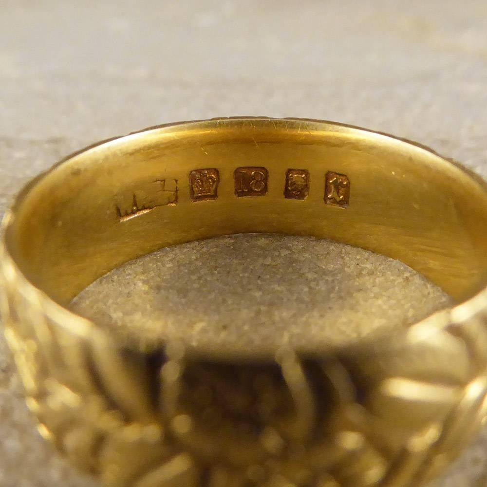 This delightful antique band was crafted in the Victorian era in 18ct yellow gold. It has a wonderful foliage design and is perfect for everyday wear!

Ring Size: UK N or US 6.75

Condition: Very Good, slightest signs of wear due to age and