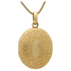 Victorian Floral Gold Double Locket, Circa 1870, in 18k Yellow Gold