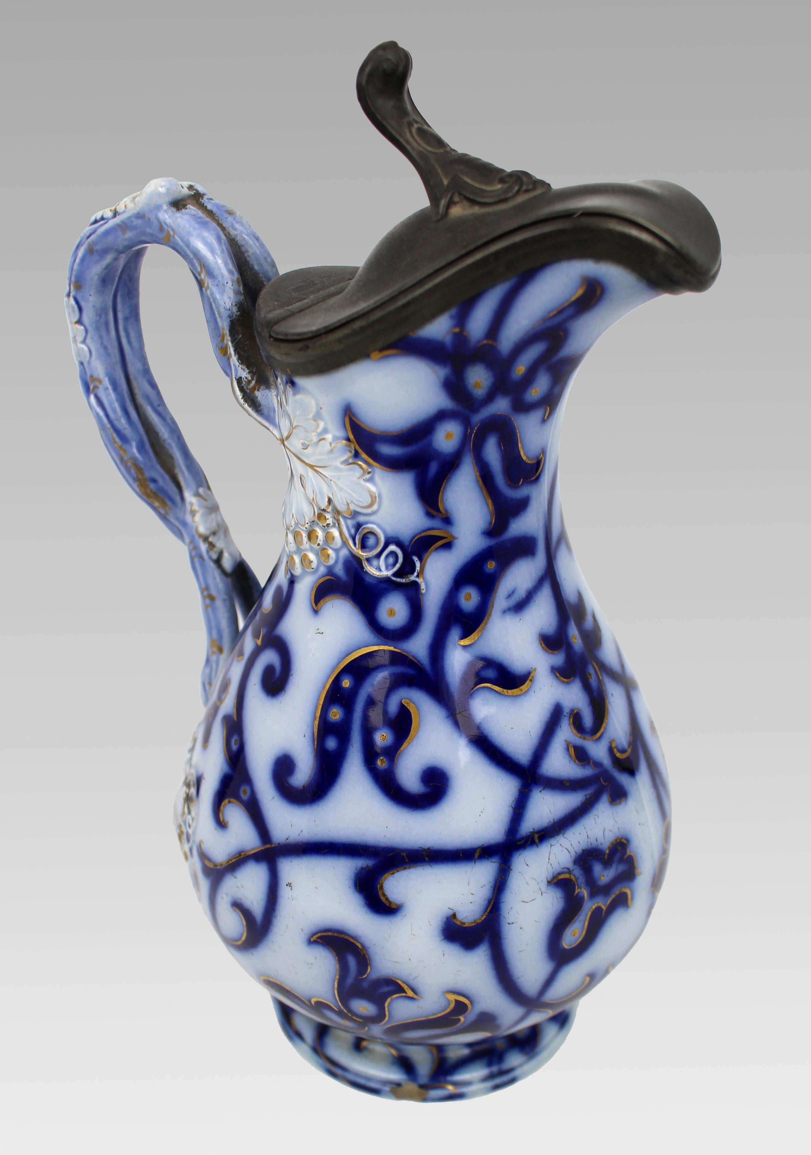 19th Century Victorian Flow Blue and Gilded Ceramic Jug with Pewter Lid, England, circa 1850 For Sale