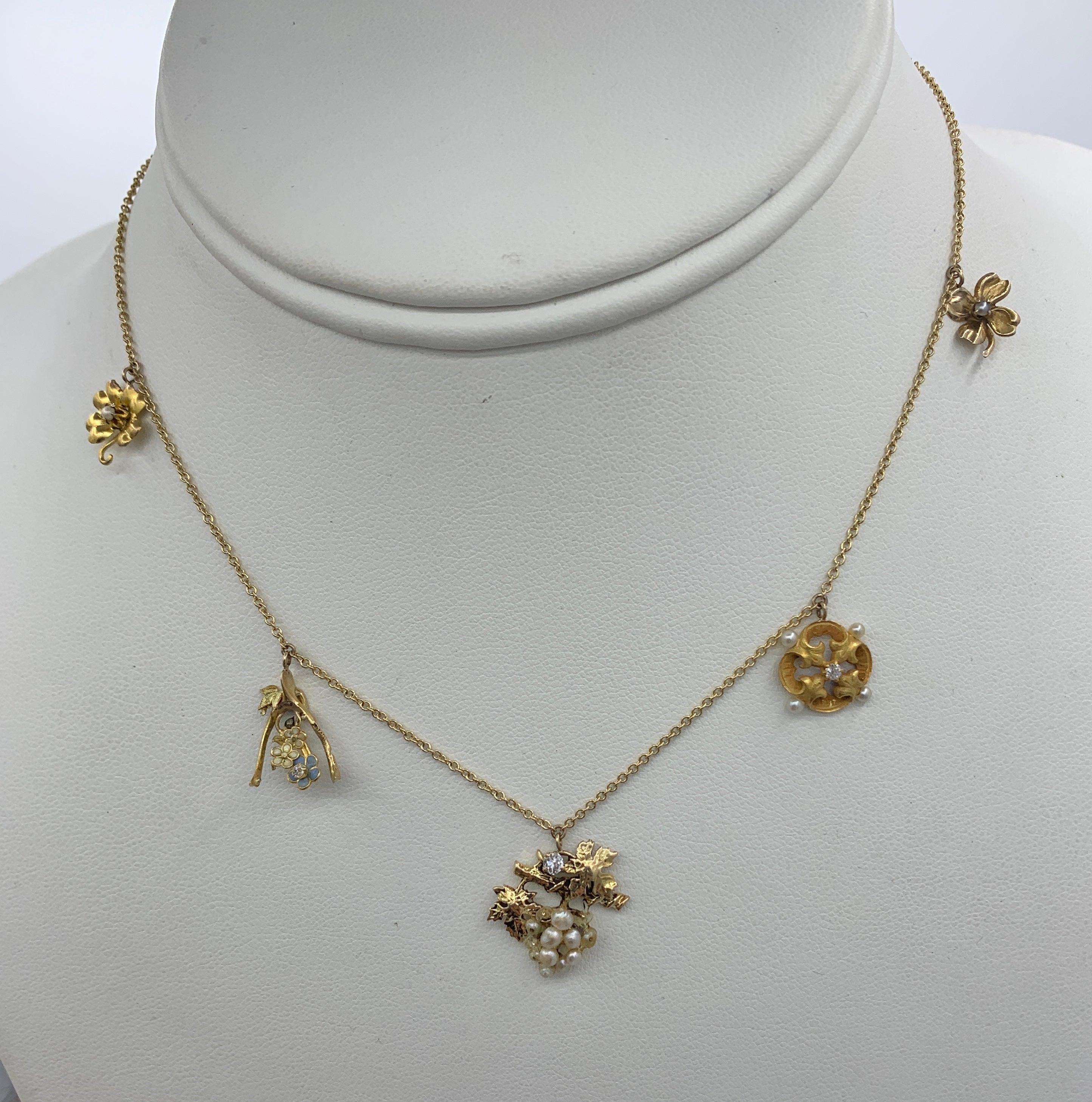 Victorian Flower Charm Necklace Old Mine Diamond Pearl Enamel 14 Karat Gold In Good Condition For Sale In New York, NY