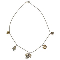Collana di fiori vittoriana con diamanti Old Mine e perle smaltate in oro 14 carati