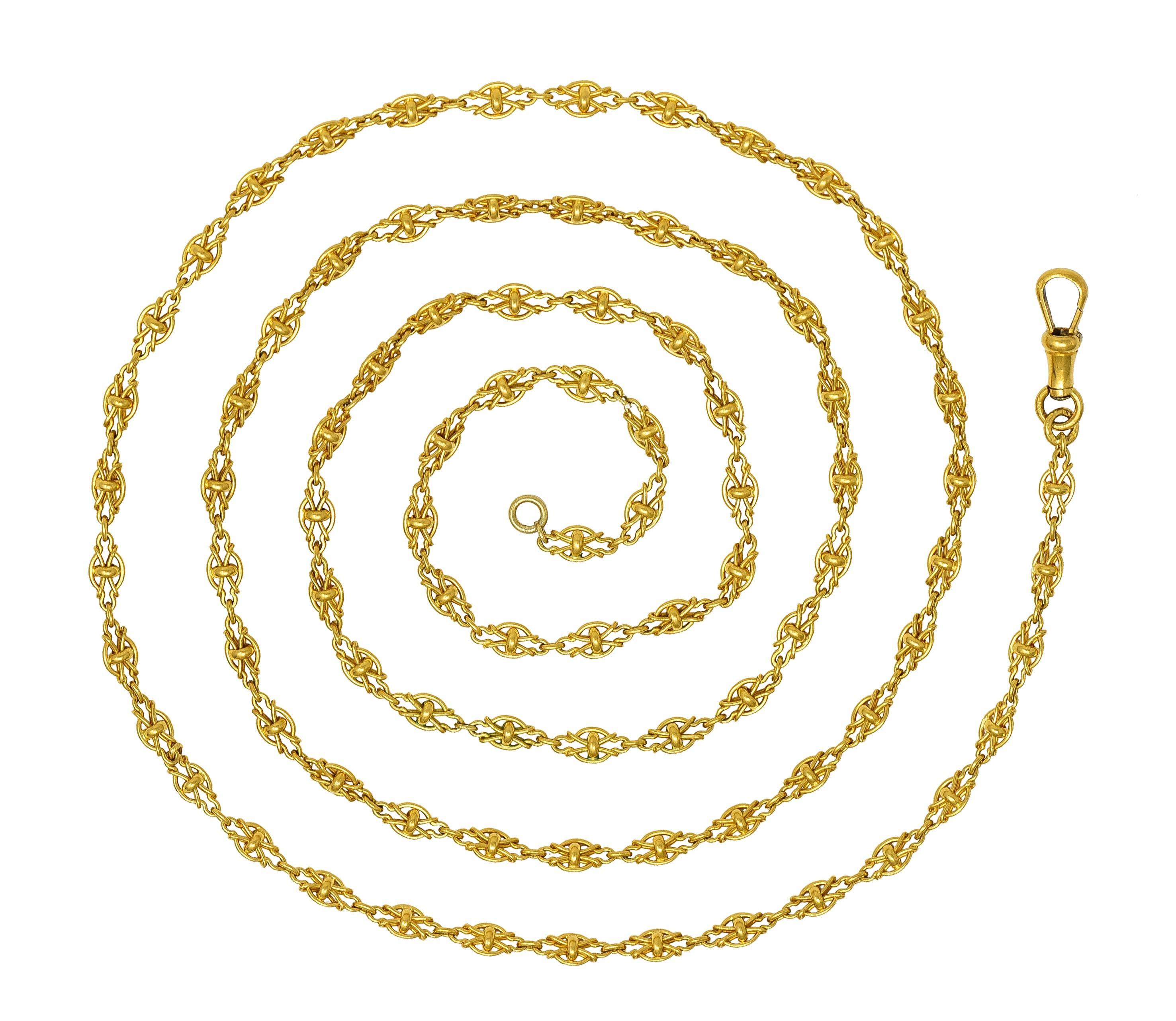 Comprised of knot-style links with single jump rings
Suspending a spinning dog clip clasp
Stamped with French hallmarks for 18 karat gold
Circa: 1870s
Width at widest: 5.0 mm 
Total length: 40.5 inches with clasp
Total weight: 41.0 grams
Stock