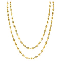 Victorian French 18 Karat Yellow Gold Knot Link Long Antique Chain Necklace