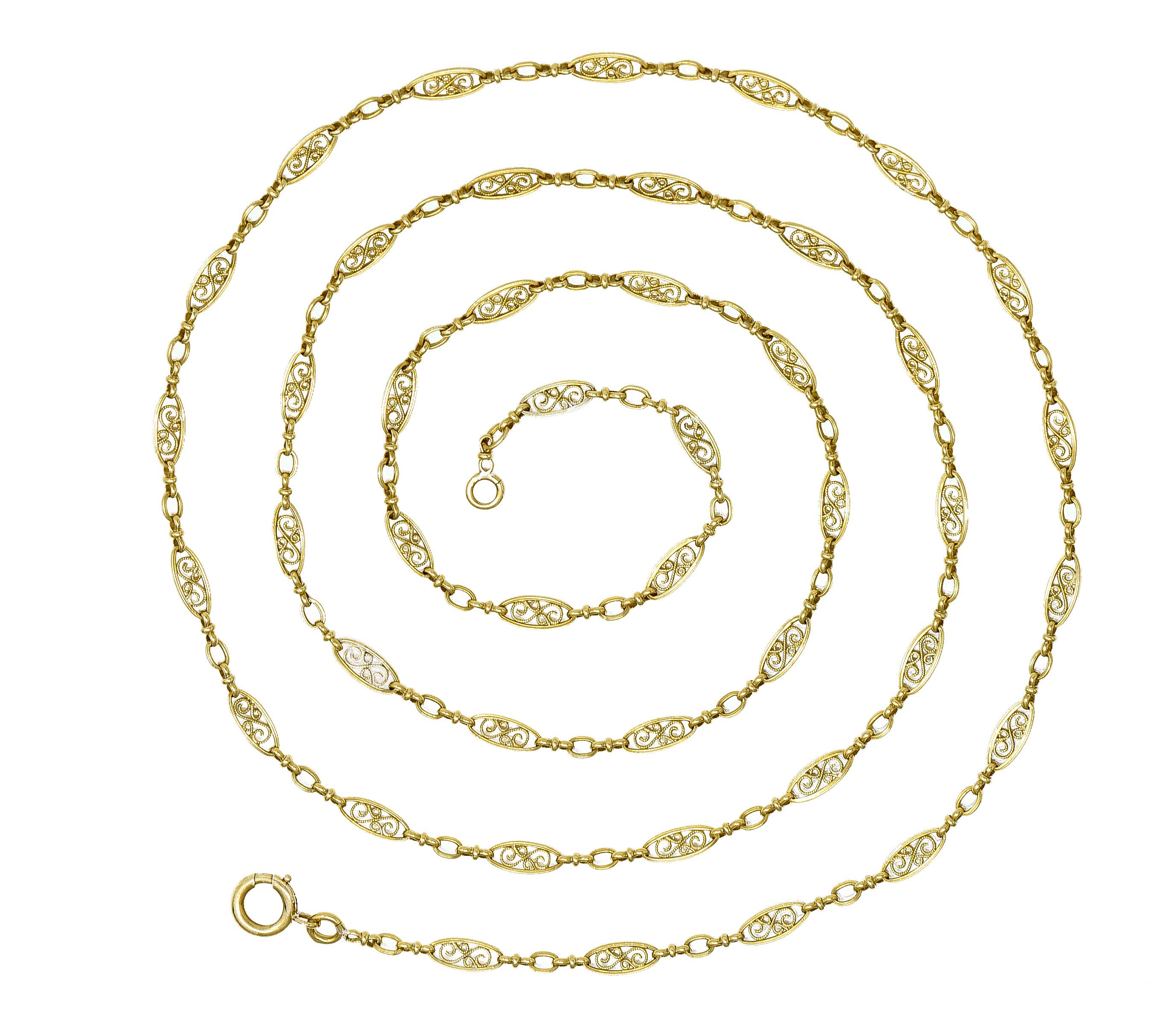 Comprised of navette-shaped links alternating with bisected and oval-shaped links
Each navette centers a filigree scroll motif with milgrain detail
Completed by spring clasp closure
With French hallmarks for 18 karat gold
Circa: 1860s
Width at