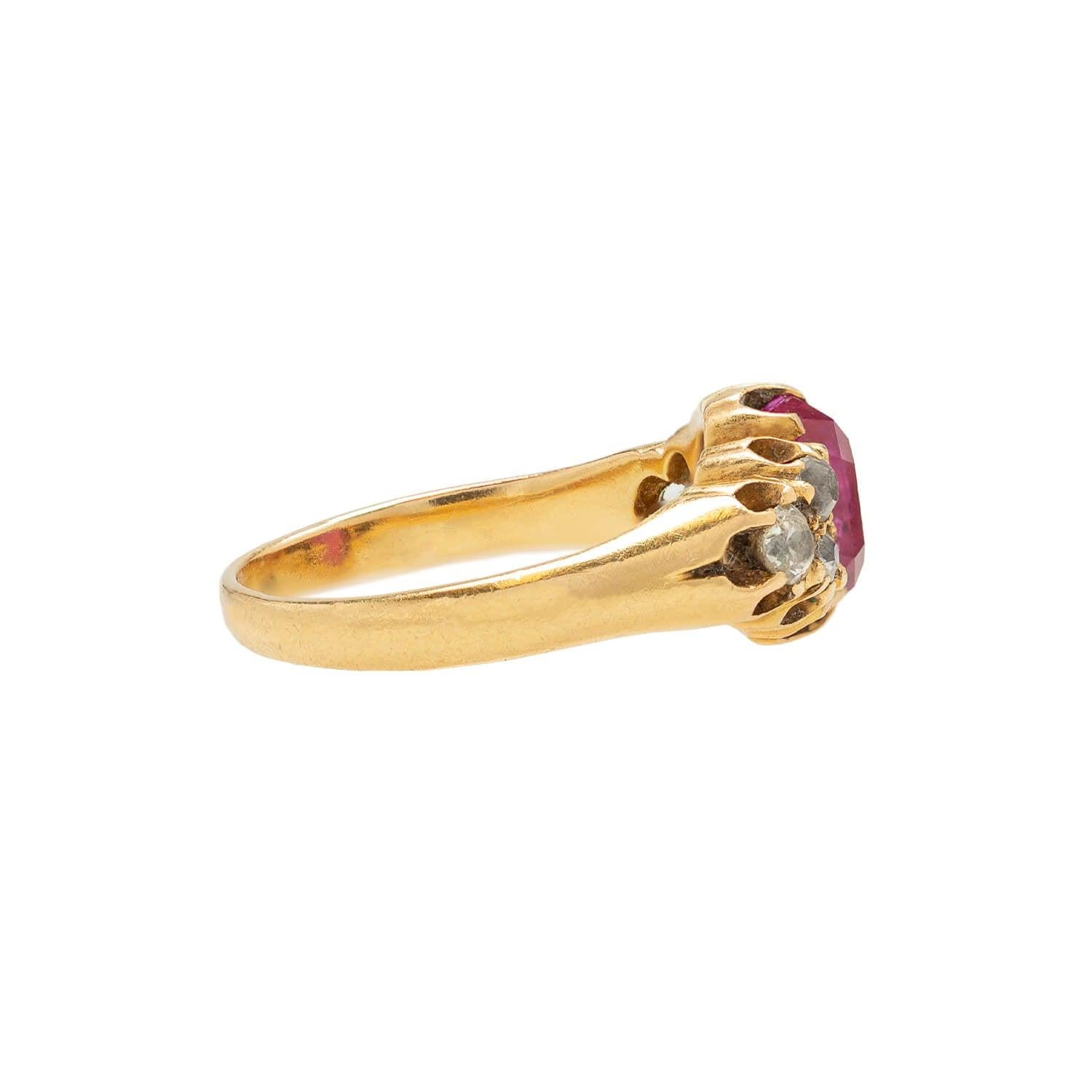 A beautiful gemstone ring from the Victorian (ca1890s) era! This gorgeous piece is crafted in rich 18k yellow gold and features a beautiful ruby amongst sparkling diamonds. Set in the center is a single estimated 2.20ctw certified oval-cut Burmese