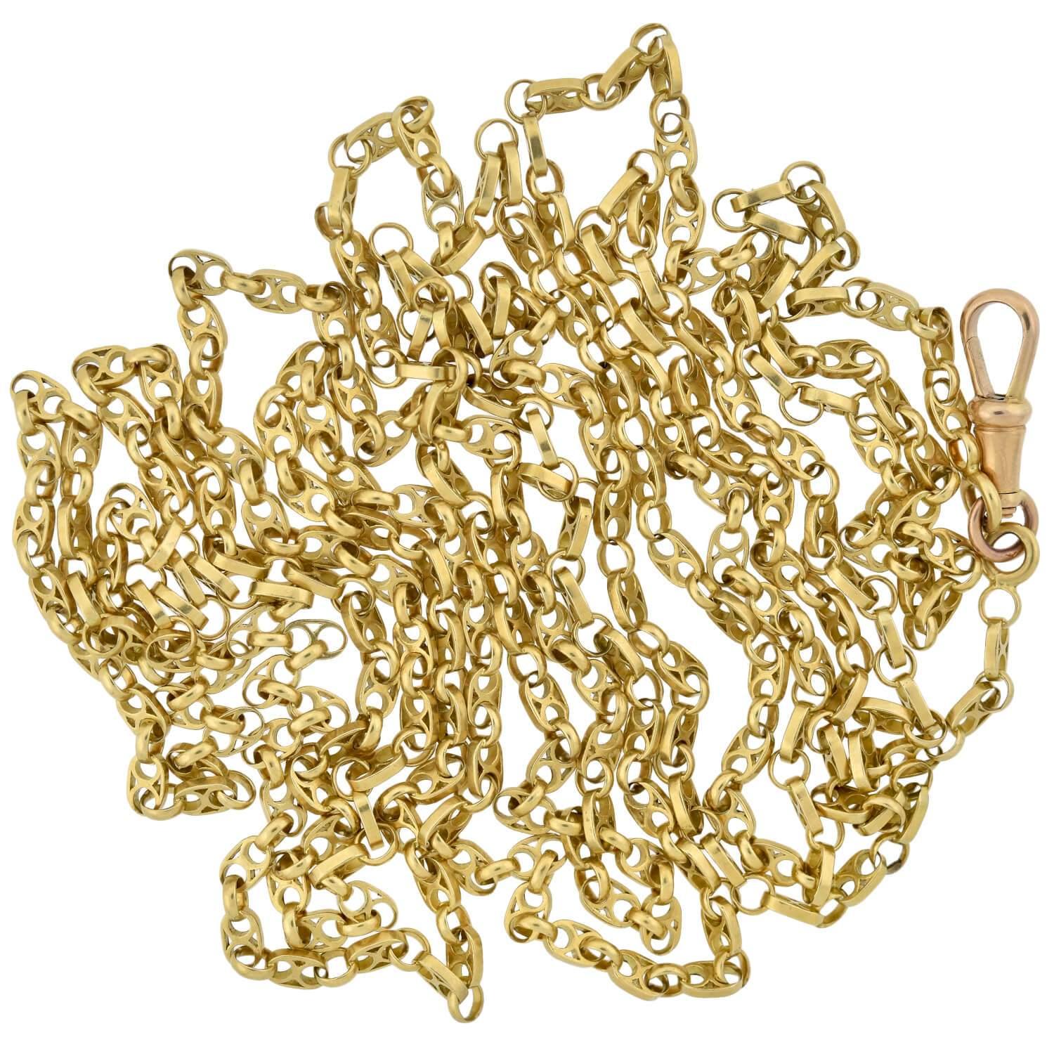 An absolutely fabulous gold watch chain from the Victorian (1880s) era! Extremely long in length, this wonderful French-made piece is comprised of elegant 18kt yellow gold links, which have a beautiful anchor-link style design. Oval links,