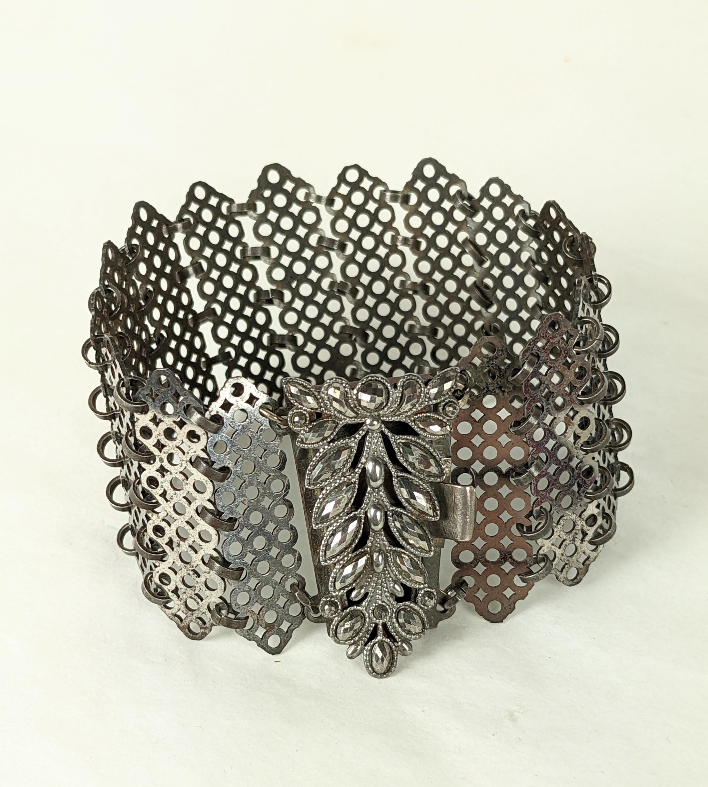 Attractive and Unusual Victorian French Cut Steel Bracelet from the mid 19th Century. Flexible links of pierced steel with cut steel marquise decorated clasp. 1840's France. 7.5