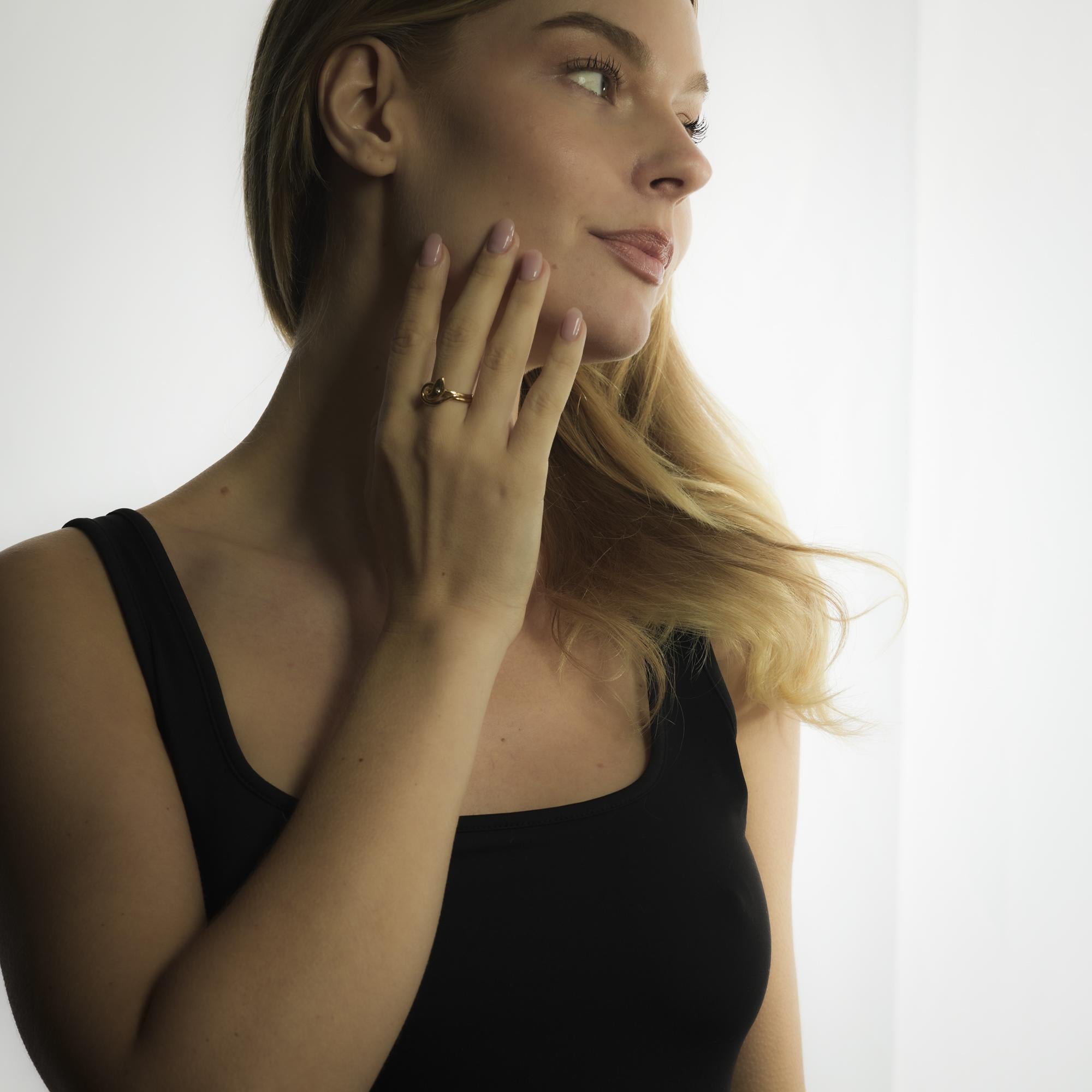 This Victorian 18k yellow gold ring features a delicate old European cut diamond, offering timeless elegance and understated charm with its refined antique craftsmanship.