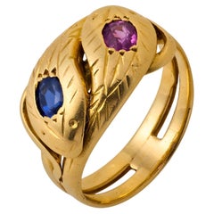 Anillo victoriano francés de serpiente de oro amarillo de 18 quilates con zafiro rosa y azul