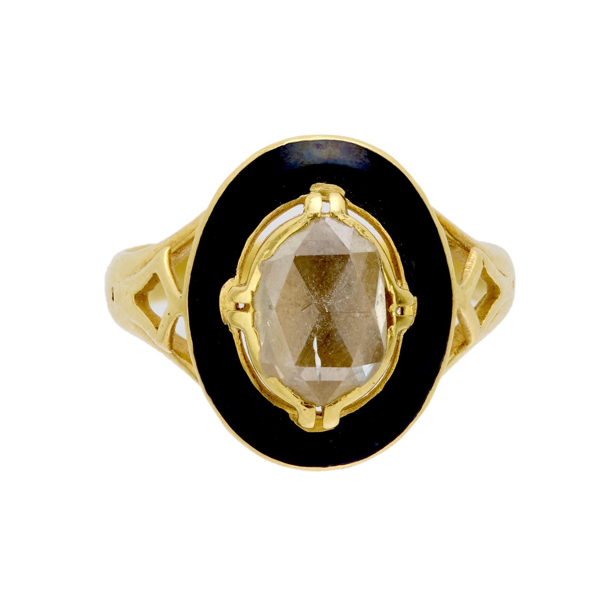 Crafted in the early 1900s, this Victorian French ring showcases a beautifully faceted rose cut diamond weighing approximately .50 carats, graded M-N color and I1 clarity. The diamond is framed by lustrous black enamel, creating a dramatic contrast