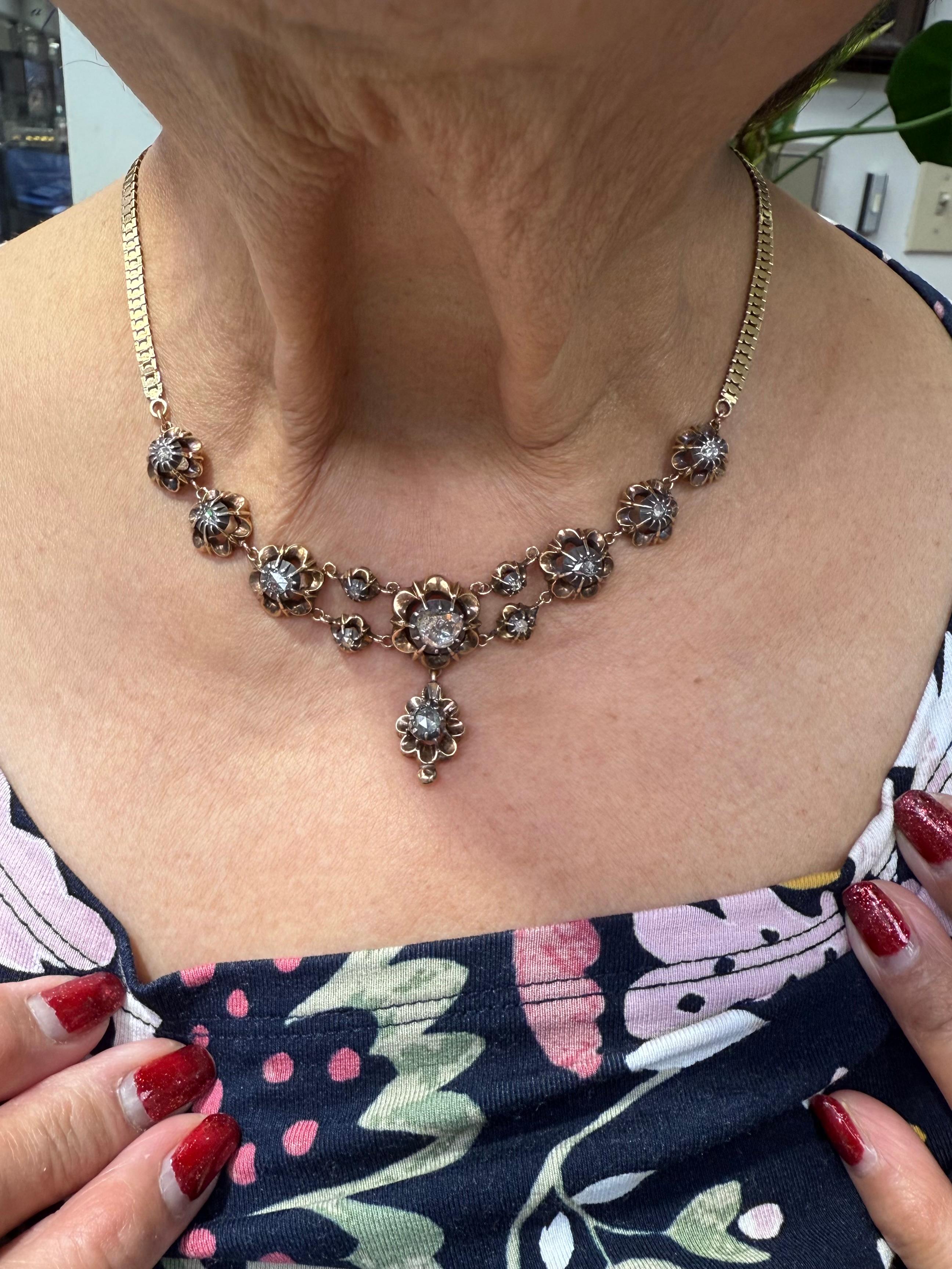 Victorian French Rosecut Diamond and 18k Yellow Gold Necklace.

The Victorian French Rosecut Diamond and 18k Yellow Gold Necklace was made in the 1880s.  Beautifully designed with elegant touches.  Various shapes and sizes of Rosecut diamonds are