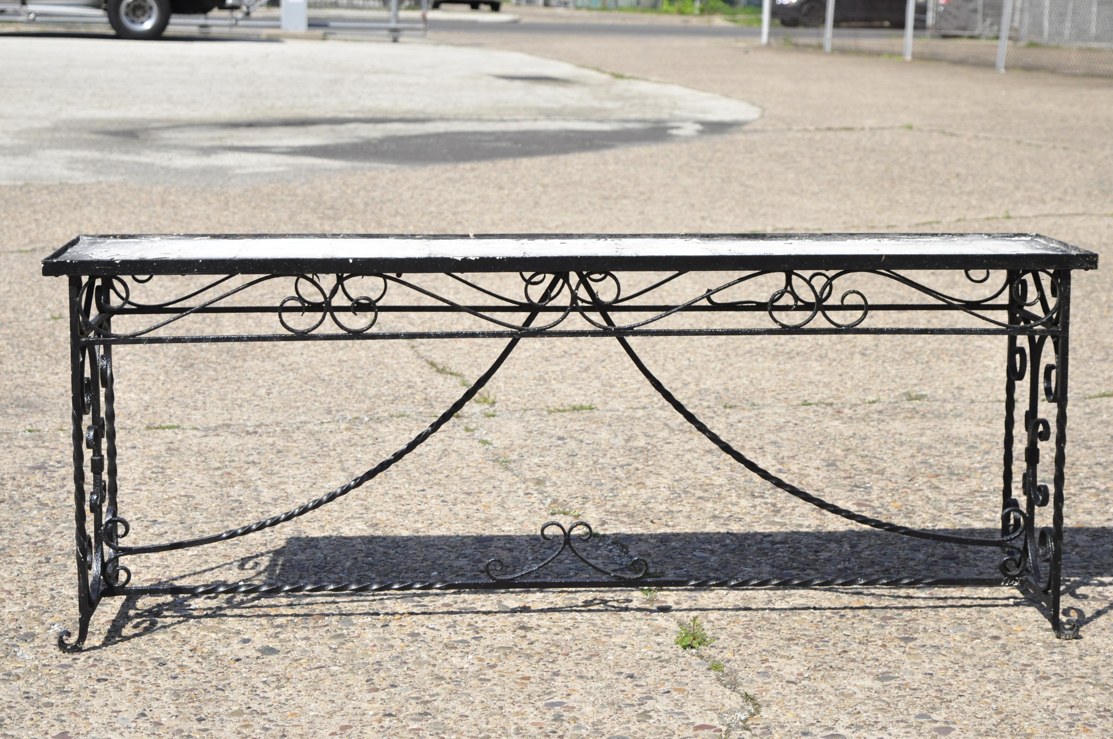 Antique Victorian French scrolling wrought iron long console sofa table plant stand. Base only. Item features heavy scrolling wrought iron base, wonderful iron work, very nice antique item, quality craftsmanship, great style and form. Great to add a