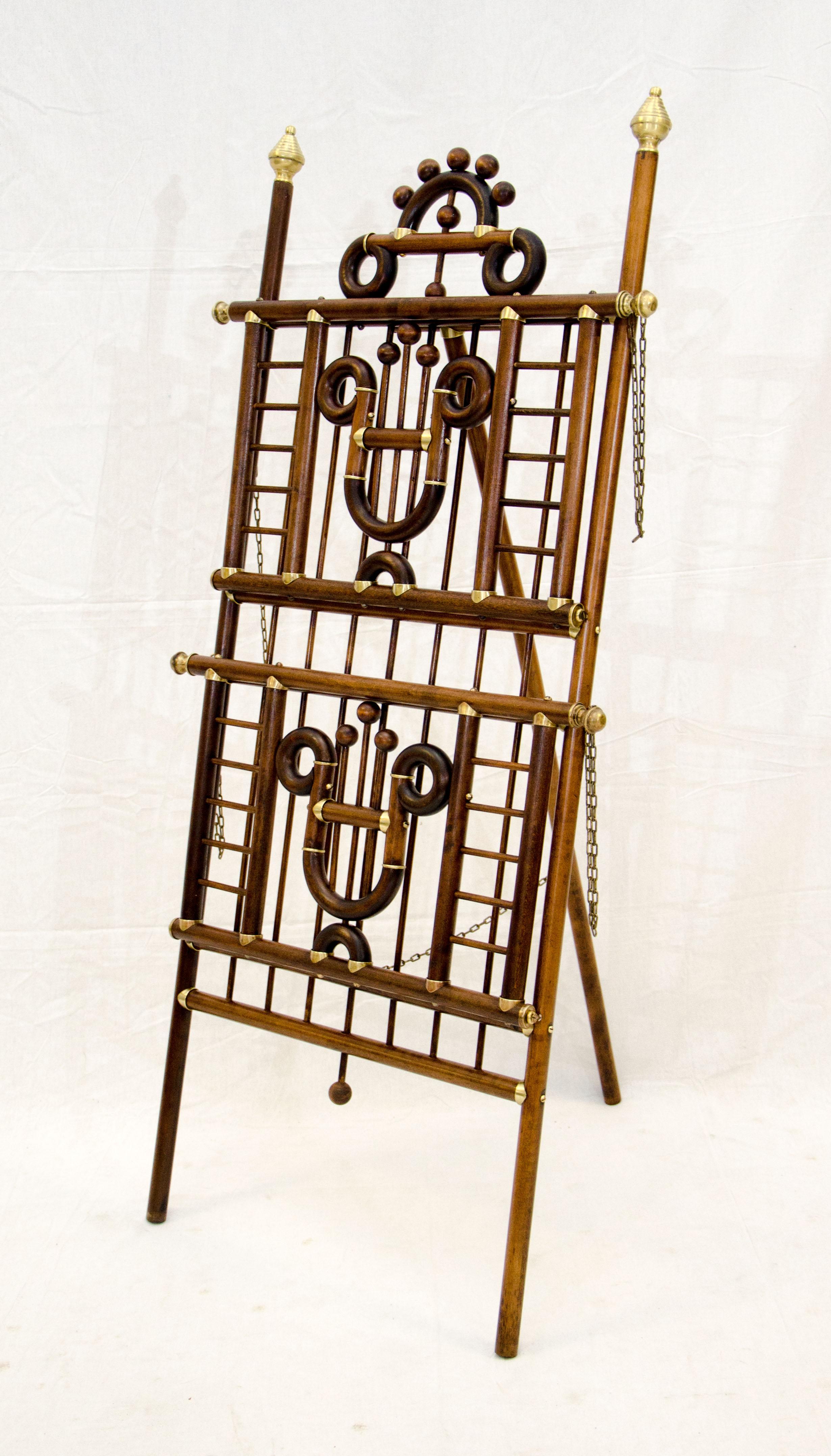 Unusual Victorian stick and ball fretwork stand that can be used for magazine, newspaper display or storage. It could also be used to display smaller pieces of artwork, a couple of coffee-table books or whatever your imagination can think of. Fully