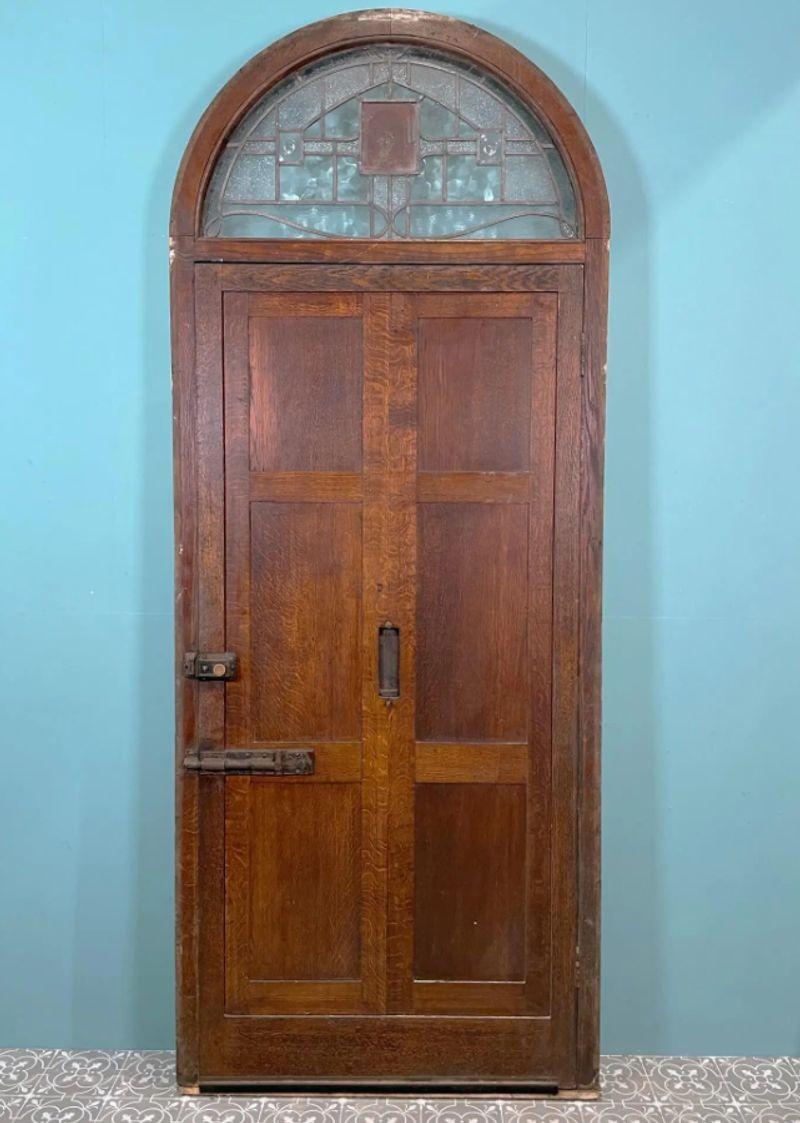 wood front door with stained glass