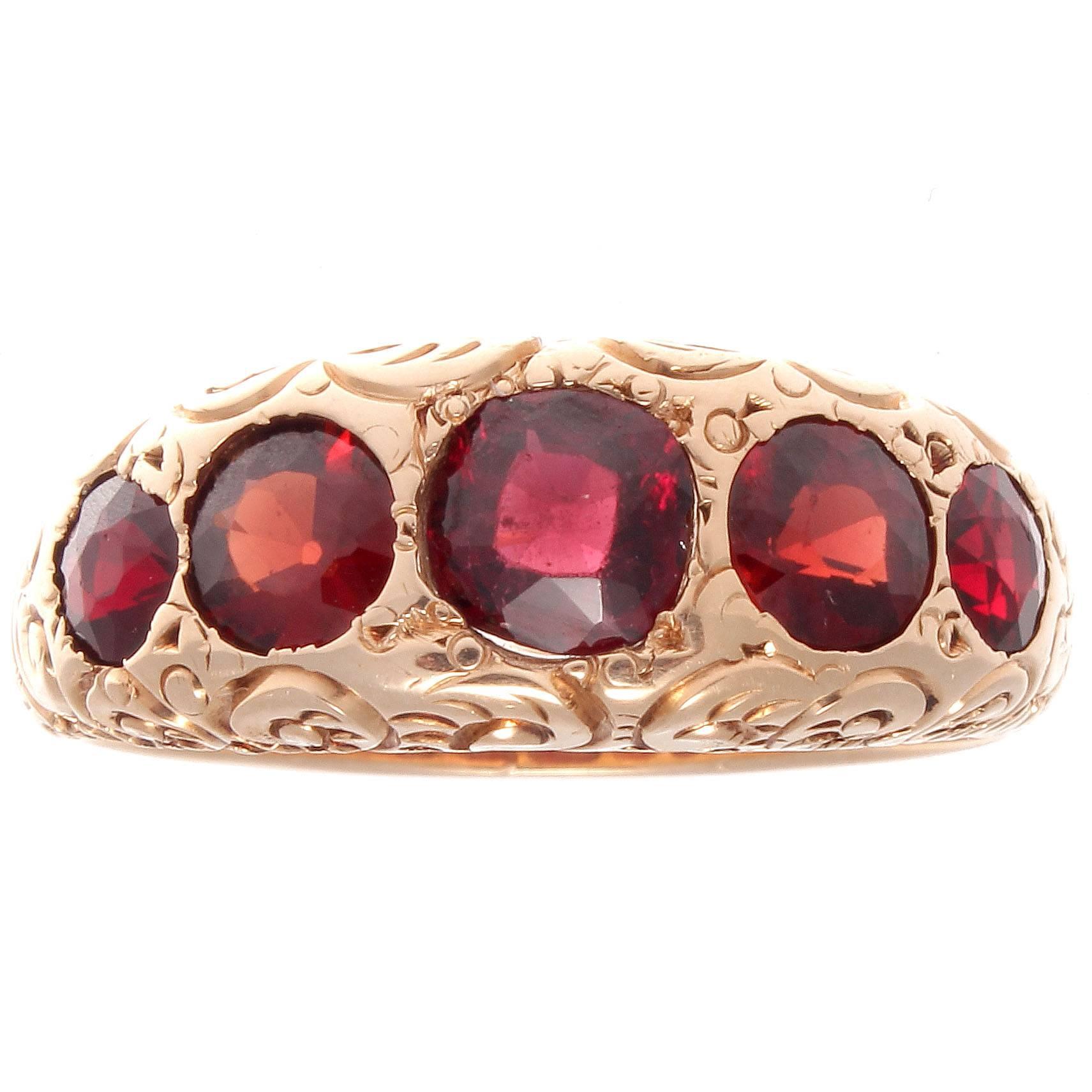A great representation of Victorian beauty.  A classic 19th century combination of 5 orange-red garnets set in an expertly filigreed 14k gold ring. 

Ring size 8-1/2 and can easily be resized, if needed this would come complimentary with your