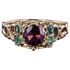 Anello vittoriano con granato in oro 12 carati