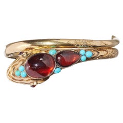 Brazalete victoriano de granate, turquesa y serpiente de oro, circa 1900