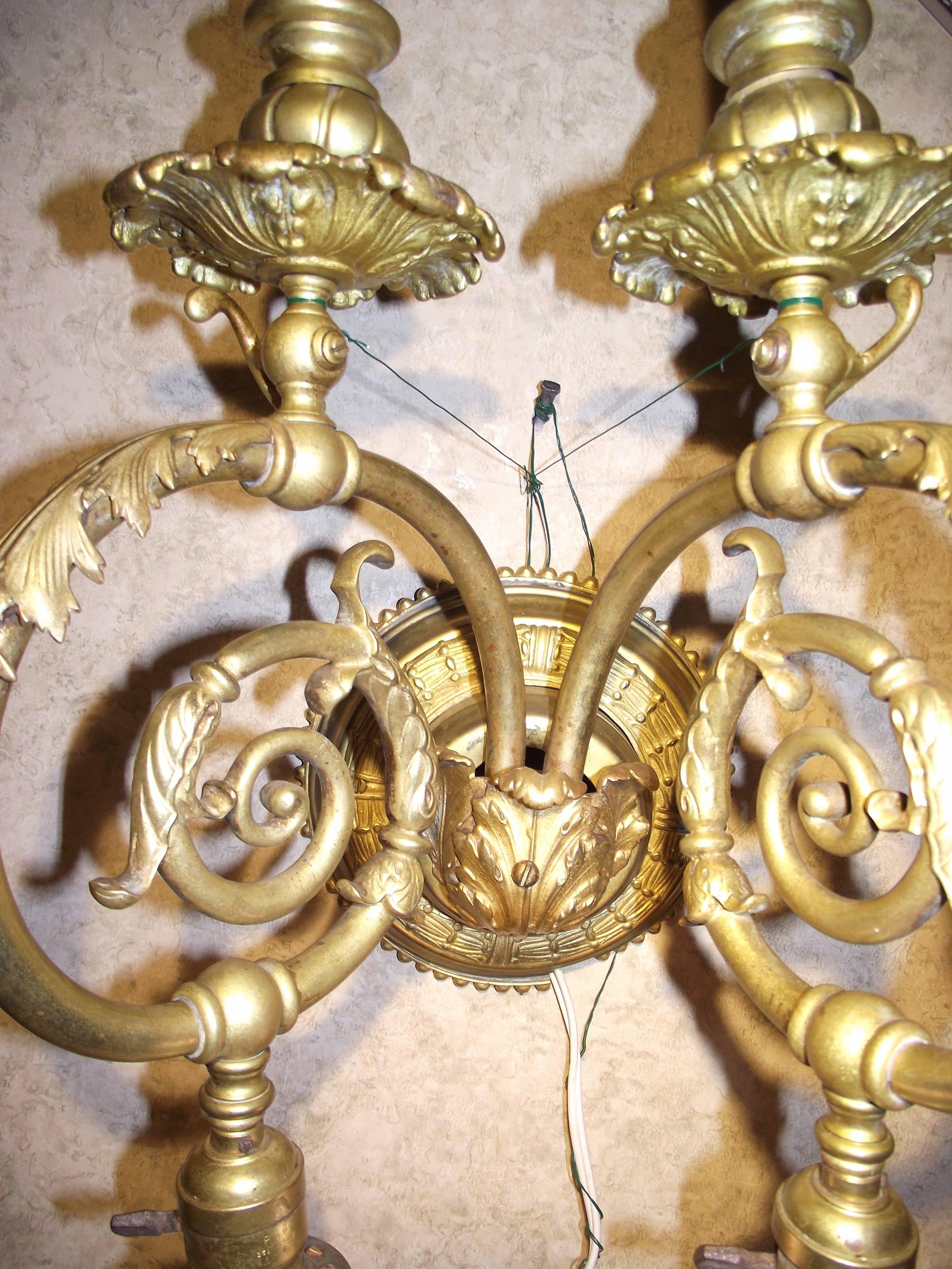 This large-scale original gilded brass gas/electric sconce is a great statement piece. It still has the gas wall connection on the back and if you are lucky enough to still have a working gas connection in your Victorian Home it could be hooked up