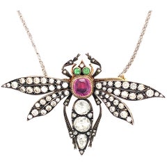Pendentif / broche libellule victorien en platine et or serti de pierres précieuses