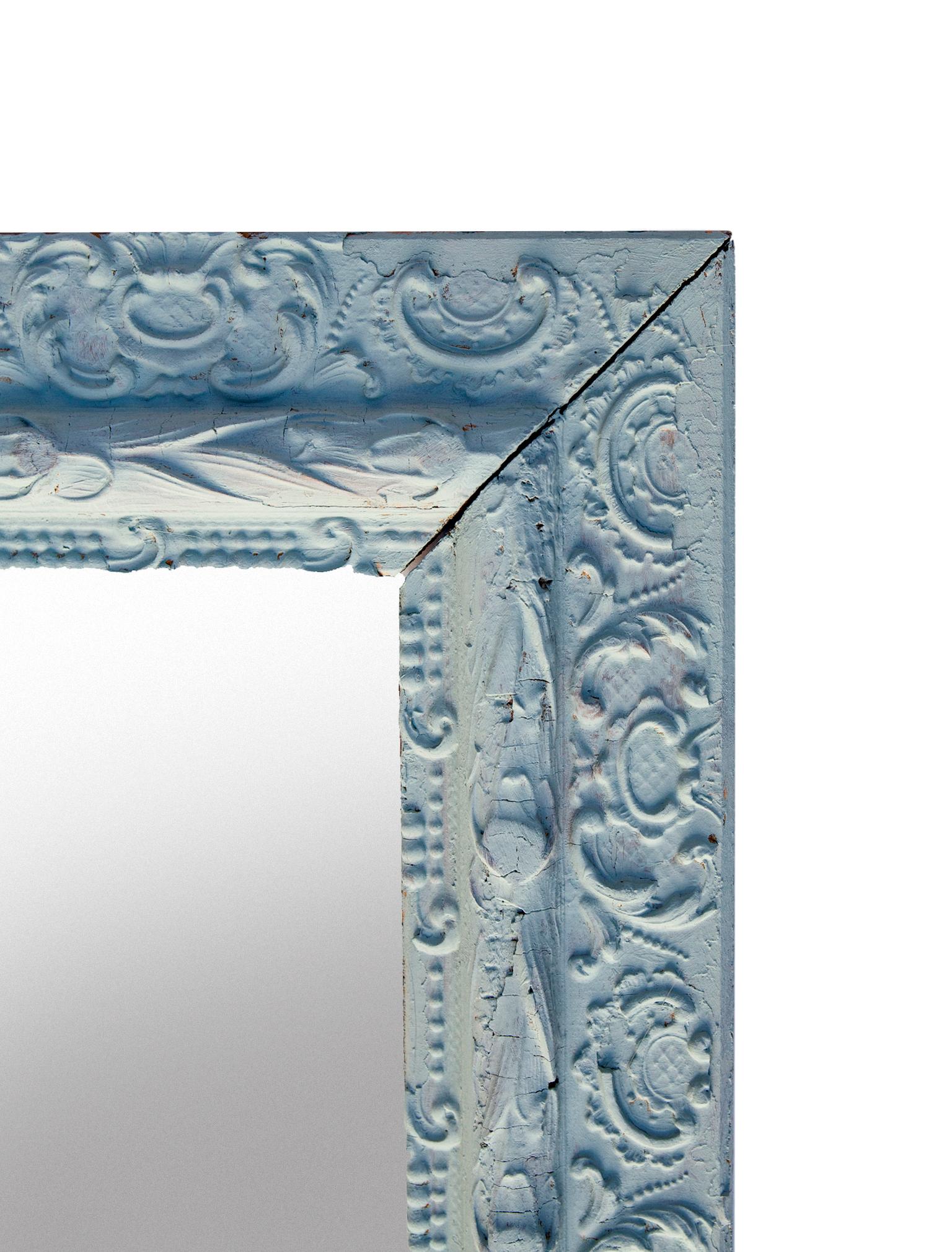 Shabby-ish Victorian blue mirror, with some chippy gesso, which is barely noticeable under the paint.
Lightweight with a flat profile, making this piece easy to hang just about anywhere.
New mirror & backing.